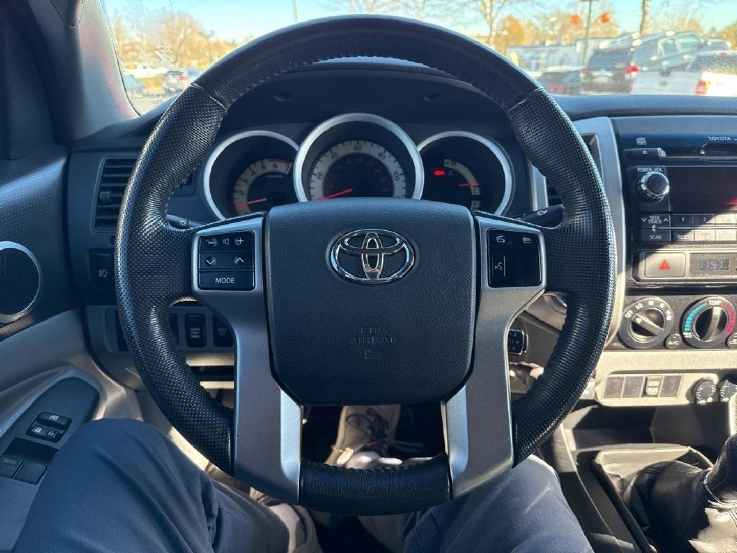 2012 Barcelona Red Metallic /Graphite Toyota Tacoma SR5 (5TFUX4EN6CX) with an 2.7L I4 DOHC 16V engine, Manual transmission, located at 10890 W. Colfax Ave., Lakewood, CO, 80215, (303) 274-7692, 39.739914, -105.120132 - 2012 Toyota Tacoma 4x4, manual transmission, 4cyl that is a 9.7 out of 10 condition wise. Non smoker, no rust and nicely equipped with SR5 package. You will not find a nicer one anywhere. <br><br>All Cars Have Clean Titles And Are Serviced Before Sale., Backup Camera, Non Smoker, No Pet Odor Or Hair - Photo#20