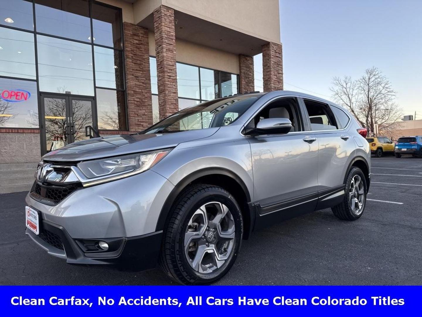 2018 Lunar Silver Metallic /Gray Honda CR-V EX (7FARW2H58JE) with an 1.5L I4 DOHC 16V engine, CVT transmission, located at 10890 W. Colfax Ave., Lakewood, CO, 80215, (303) 274-7692, 39.739914, -105.120132 - 2018 Honda CR-V AWD All Cars Have Clean Titles And Are Serviced Before Sale., Clean Carfax, No Accident, Apple/Android Car Play, Backup Camera, Non Smoker, No Pet Odor Or Hair, AWD.D1 Auto NEVER charges dealer fees! All cars have clean titles and have been inspected for mechanical issues. We have fi - Photo#0