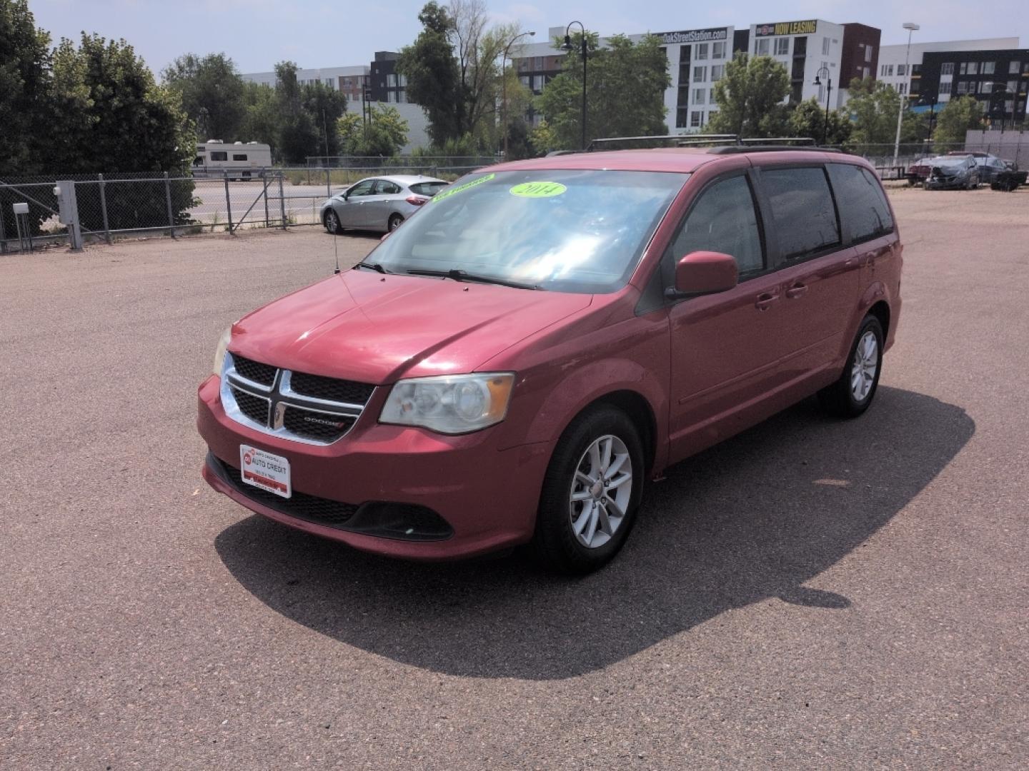 2014 RED Dodge Grand Caravan SXT (2C4RDGCG8ER) with an V6, 3.6L engine, Automatic transmission, located at 10890 W. Colfax Ave., Lakewood, CO, 80215, (303) 274-7692, 39.739914, -105.120132- Photo#0