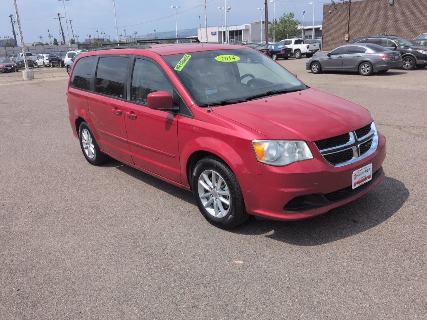 2014 RED Dodge Grand Caravan SXT (2C4RDGCG8ER) with an V6, 3.6L engine, Automatic transmission, located at 10890 W. Colfax Ave., Lakewood, CO, 80215, (303) 274-7692, 39.739914, -105.120132- Photo#2
