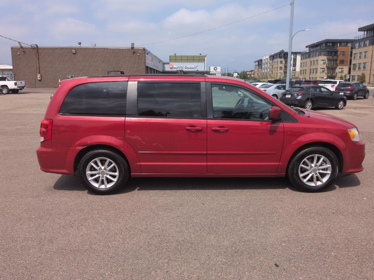 2014 RED Dodge Grand Caravan SXT (2C4RDGCG8ER) with an V6, 3.6L engine, Automatic transmission, located at 10890 W. Colfax Ave., Lakewood, CO, 80215, (303) 274-7692, 39.739914, -105.120132- Photo#3
