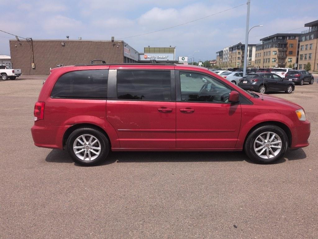 2014 RED Dodge Grand Caravan SXT (2C4RDGCG8ER) with an V6, 3.6L engine, Automatic transmission, located at 10890 W. Colfax Ave., Lakewood, CO, 80215, (303) 274-7692, 39.739914, -105.120132- Photo#3