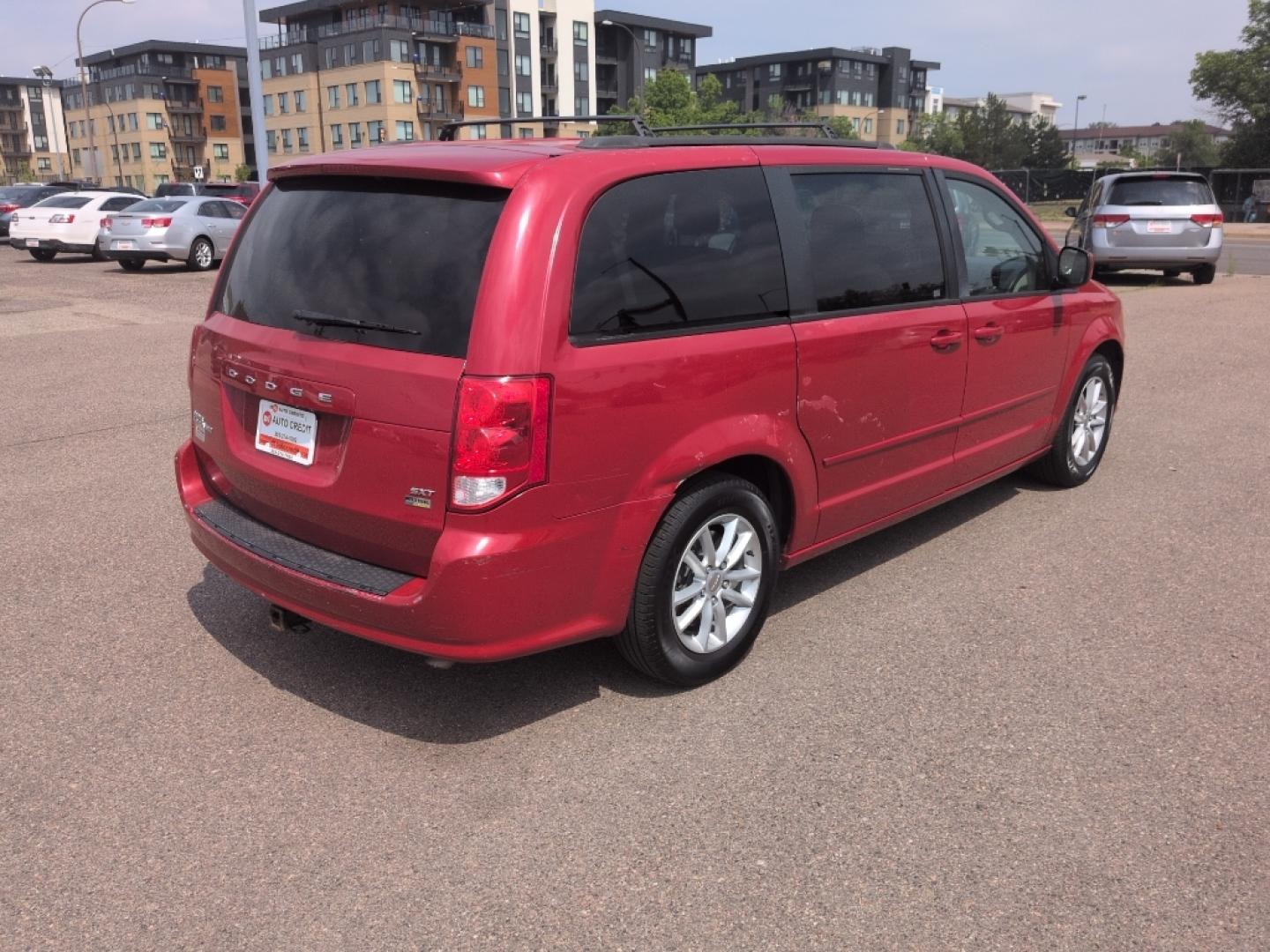2014 RED Dodge Grand Caravan SXT (2C4RDGCG8ER) with an V6, 3.6L engine, Automatic transmission, located at 10890 W. Colfax Ave., Lakewood, CO, 80215, (303) 274-7692, 39.739914, -105.120132- Photo#4