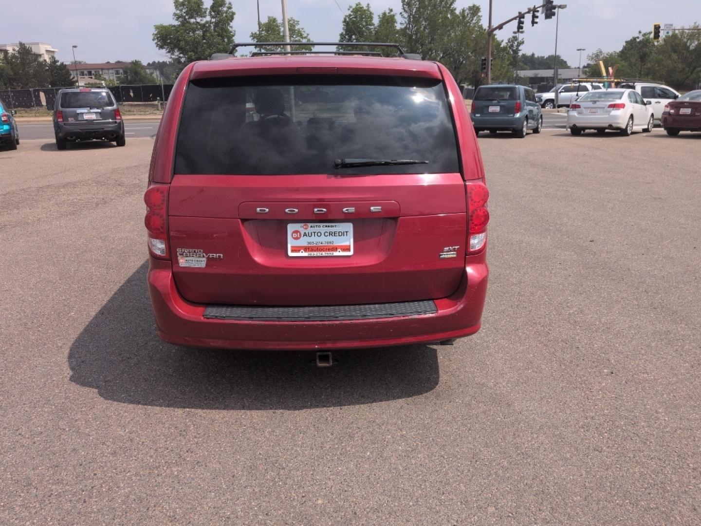 2014 RED Dodge Grand Caravan SXT (2C4RDGCG8ER) with an V6, 3.6L engine, Automatic transmission, located at 10890 W. Colfax Ave., Lakewood, CO, 80215, (303) 274-7692, 39.739914, -105.120132- Photo#5