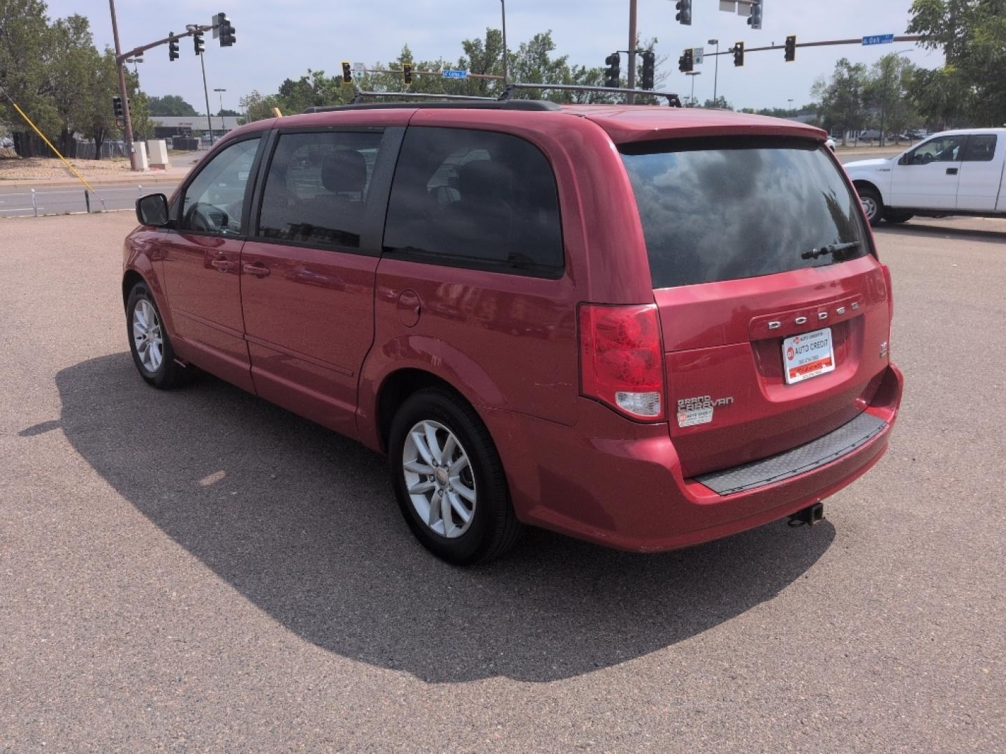 2014 RED Dodge Grand Caravan SXT (2C4RDGCG8ER) with an V6, 3.6L engine, Automatic transmission, located at 10890 W. Colfax Ave., Lakewood, CO, 80215, (303) 274-7692, 39.739914, -105.120132- Photo#6