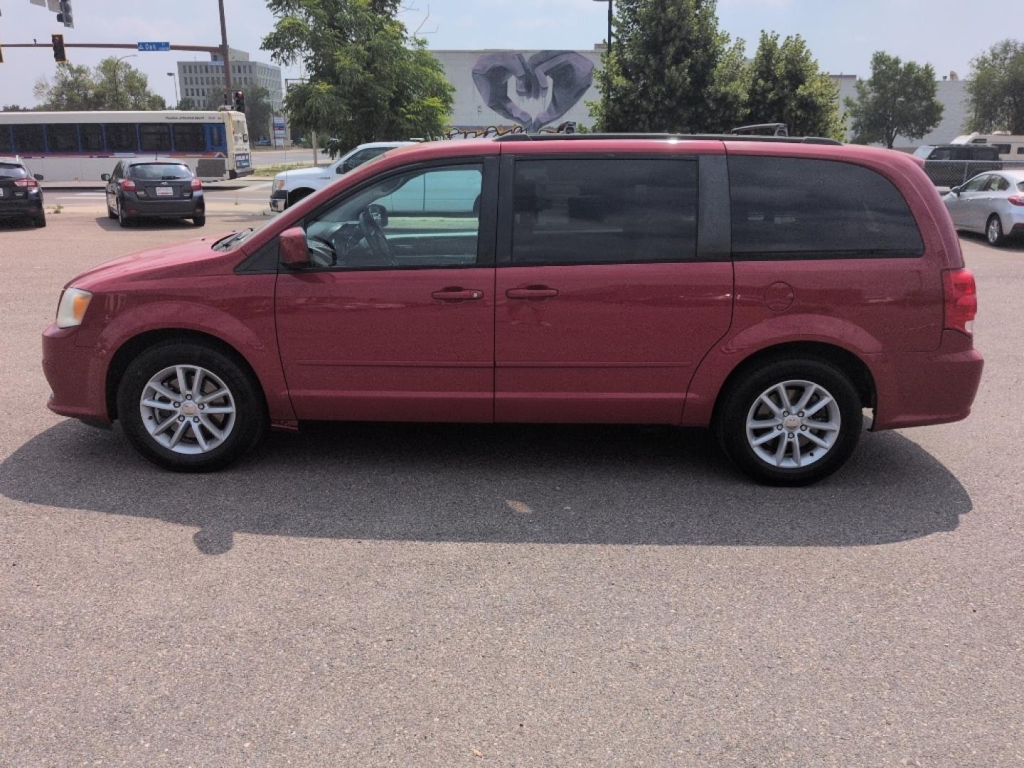 2014 RED Dodge Grand Caravan SXT (2C4RDGCG8ER) with an V6, 3.6L engine, Automatic transmission, located at 10890 W. Colfax Ave., Lakewood, CO, 80215, (303) 274-7692, 39.739914, -105.120132- Photo#7