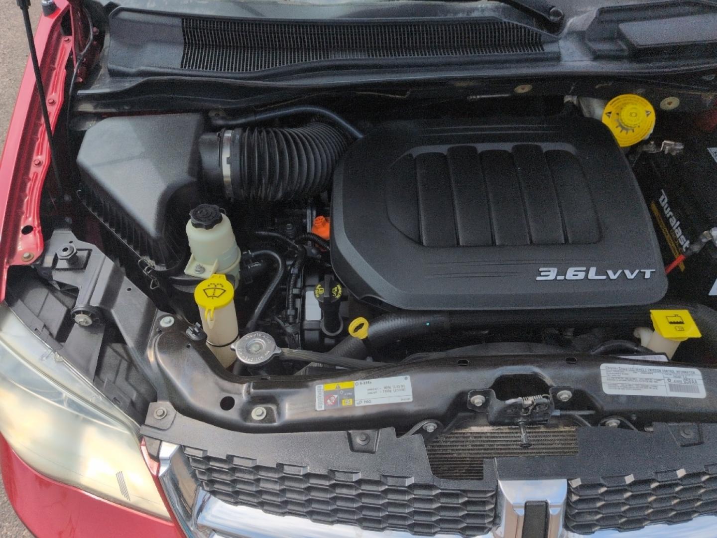 2014 RED Dodge Grand Caravan SXT (2C4RDGCG8ER) with an V6, 3.6L engine, Automatic transmission, located at 10890 W. Colfax Ave., Lakewood, CO, 80215, (303) 274-7692, 39.739914, -105.120132- Photo#20