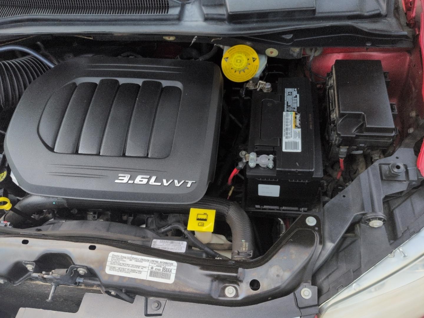 2014 RED Dodge Grand Caravan SXT (2C4RDGCG8ER) with an V6, 3.6L engine, Automatic transmission, located at 10890 W. Colfax Ave., Lakewood, CO, 80215, (303) 274-7692, 39.739914, -105.120132- Photo#21