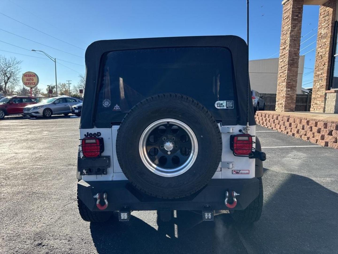1994 White /Black Jeep Wrangler S (1J4FY19P2RP) with an 2.5L I4 8V engine, Automatic transmission, located at 10890 W. Colfax Ave., Lakewood, CO, 80215, (303) 274-7692, 39.739914, -105.120132 - 1994 Jeep Wrangler 4WD that someone spent a lot of time and money rebuilding so you dont need to! Rebuilt from the ground up and runs great. Lots of extras goodies and ready for any sort of adventure. <br><br>D1 Auto NEVER charges dealer fees! All cars have clean titles and have been inspected for m - Photo#4