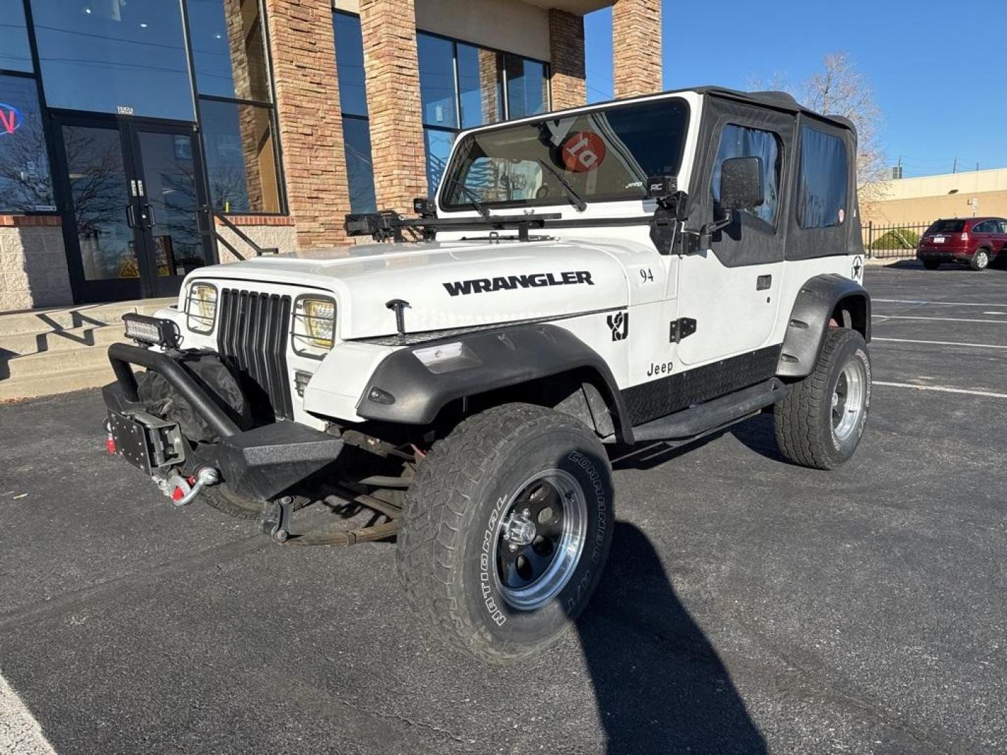 1994 White /Black Jeep Wrangler S (1J4FY19P2RP) with an 2.5L I4 8V engine, Automatic transmission, located at 10890 W. Colfax Ave., Lakewood, CO, 80215, (303) 274-7692, 39.739914, -105.120132 - 1994 Jeep Wrangler 4WD that someone spent a lot of time and money rebuilding so you dont need to! Rebuilt from the ground up and runs great. Lots of extras goodies and ready for any sort of adventure. <br><br>D1 Auto NEVER charges dealer fees! All cars have clean titles and have been inspected for m - Photo#7
