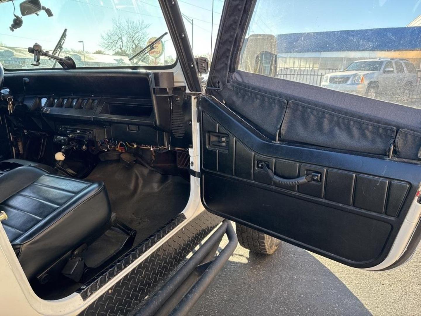 1994 White /Black Jeep Wrangler S (1J4FY19P2RP) with an 2.5L I4 8V engine, Automatic transmission, located at 10890 W. Colfax Ave., Lakewood, CO, 80215, (303) 274-7692, 39.739914, -105.120132 - 1994 Jeep Wrangler 4WD that someone spent a lot of time and money rebuilding so you dont need to! Rebuilt from the ground up and runs great. Lots of extras goodies and ready for any sort of adventure. <br><br>D1 Auto NEVER charges dealer fees! All cars have clean titles and have been inspected for m - Photo#10