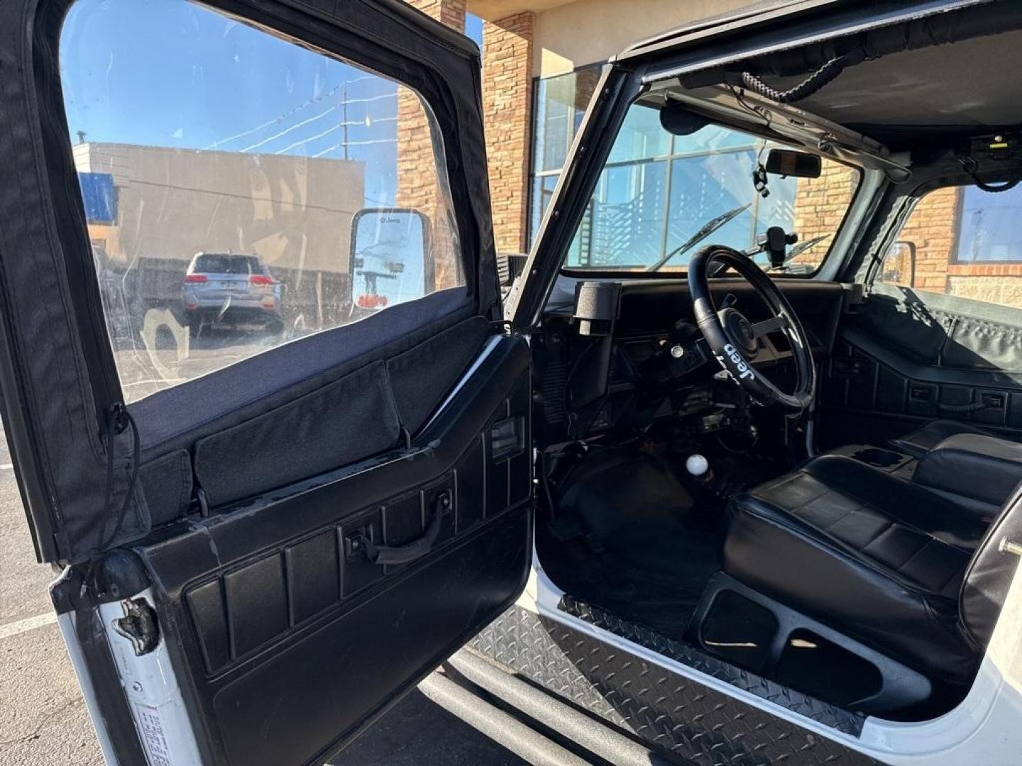 1994 White /Black Jeep Wrangler S (1J4FY19P2RP) with an 2.5L I4 8V engine, Automatic transmission, located at 10890 W. Colfax Ave., Lakewood, CO, 80215, (303) 274-7692, 39.739914, -105.120132 - 1994 Jeep Wrangler 4WD that someone spent a lot of time and money rebuilding so you dont need to! Rebuilt from the ground up and runs great. Lots of extras goodies and ready for any sort of adventure. <br><br>D1 Auto NEVER charges dealer fees! All cars have clean titles and have been inspected for m - Photo#18