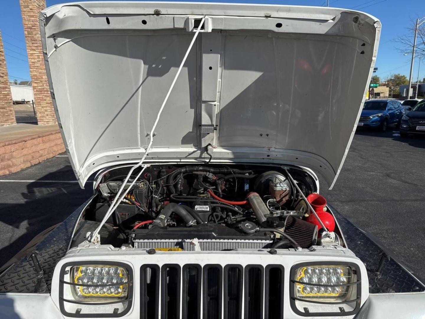 1994 White /Black Jeep Wrangler S (1J4FY19P2RP) with an 2.5L I4 8V engine, Automatic transmission, located at 10890 W. Colfax Ave., Lakewood, CO, 80215, (303) 274-7692, 39.739914, -105.120132 - 1994 Jeep Wrangler 4WD that someone spent a lot of time and money rebuilding so you dont need to! Rebuilt from the ground up and runs great. Lots of extras goodies and ready for any sort of adventure. <br><br>D1 Auto NEVER charges dealer fees! All cars have clean titles and have been inspected for m - Photo#35