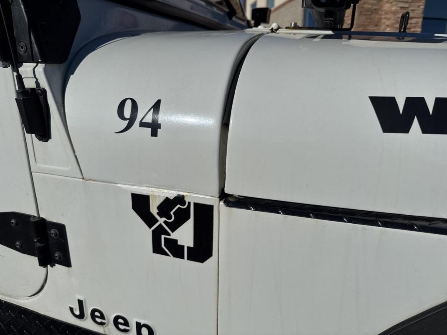 1994 White /Black Jeep Wrangler S (1J4FY19P2RP) with an 2.5L I4 8V engine, Automatic transmission, located at 10890 W. Colfax Ave., Lakewood, CO, 80215, (303) 274-7692, 39.739914, -105.120132 - 1994 Jeep Wrangler 4WD that someone spent a lot of time and money rebuilding so you dont need to! Rebuilt from the ground up and runs great. Lots of extras goodies and ready for any sort of adventure. <br><br>D1 Auto NEVER charges dealer fees! All cars have clean titles and have been inspected for m - Photo#38