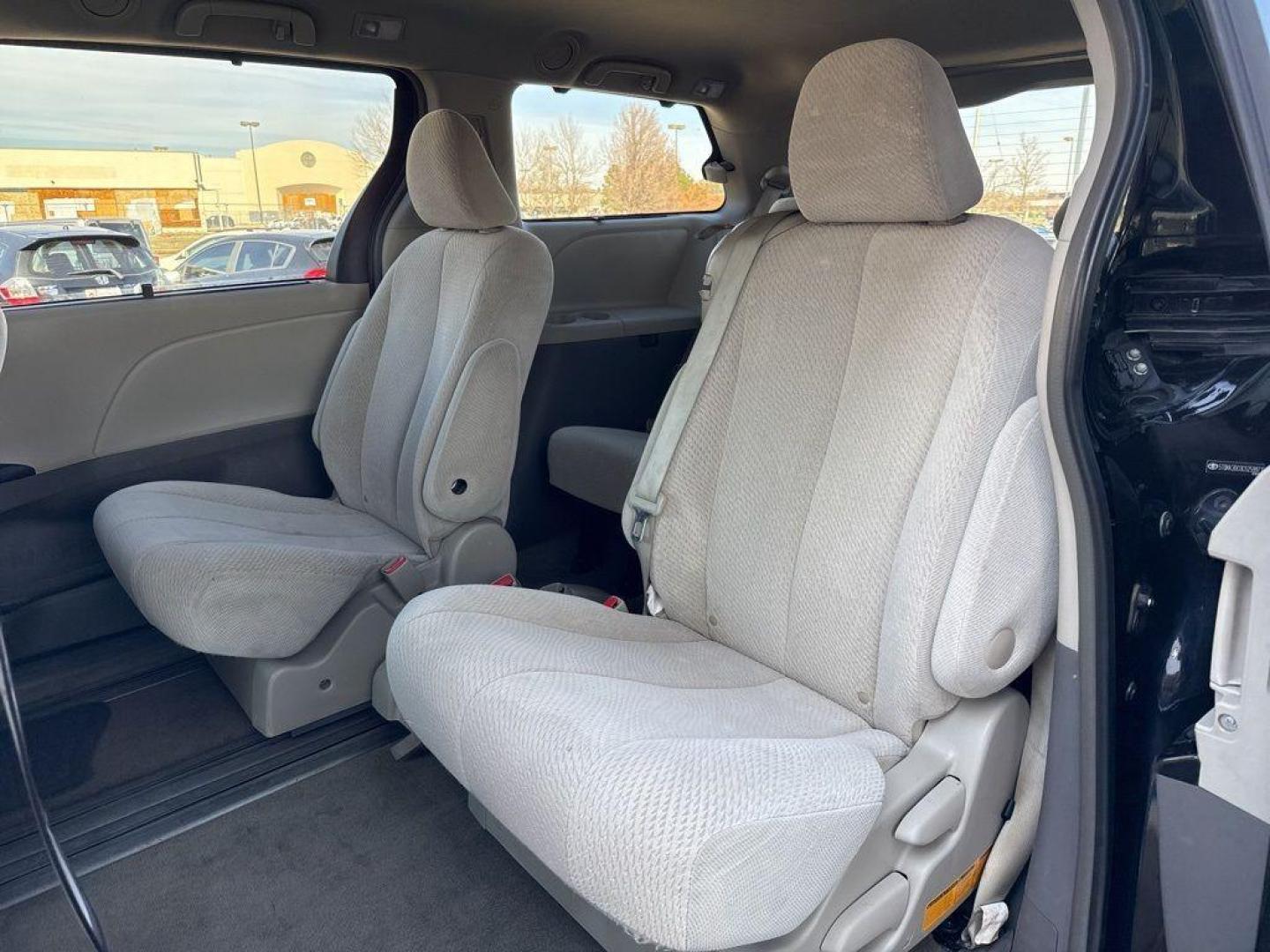 2012 BLACK Toyota Sienna LE FWD 8-PASSENGER V (5TDKK3DC0CS) with an V6, 3.5L engine, Automatic transmission, located at 10890 W. Colfax Ave., Lakewood, CO, 80215, (303) 274-7692, 39.739914, -105.120132 - Discover the perfect blend of comfort, versatility, and reliability with this 2012 Toyota Sienna LE FWD 8-Passenger Van. Designed to accommodate the needs of families and adventurers alike, this vehicle offers ample space without compromising on performance. <br><br>Under the hood, you'll find a rob - Photo#19