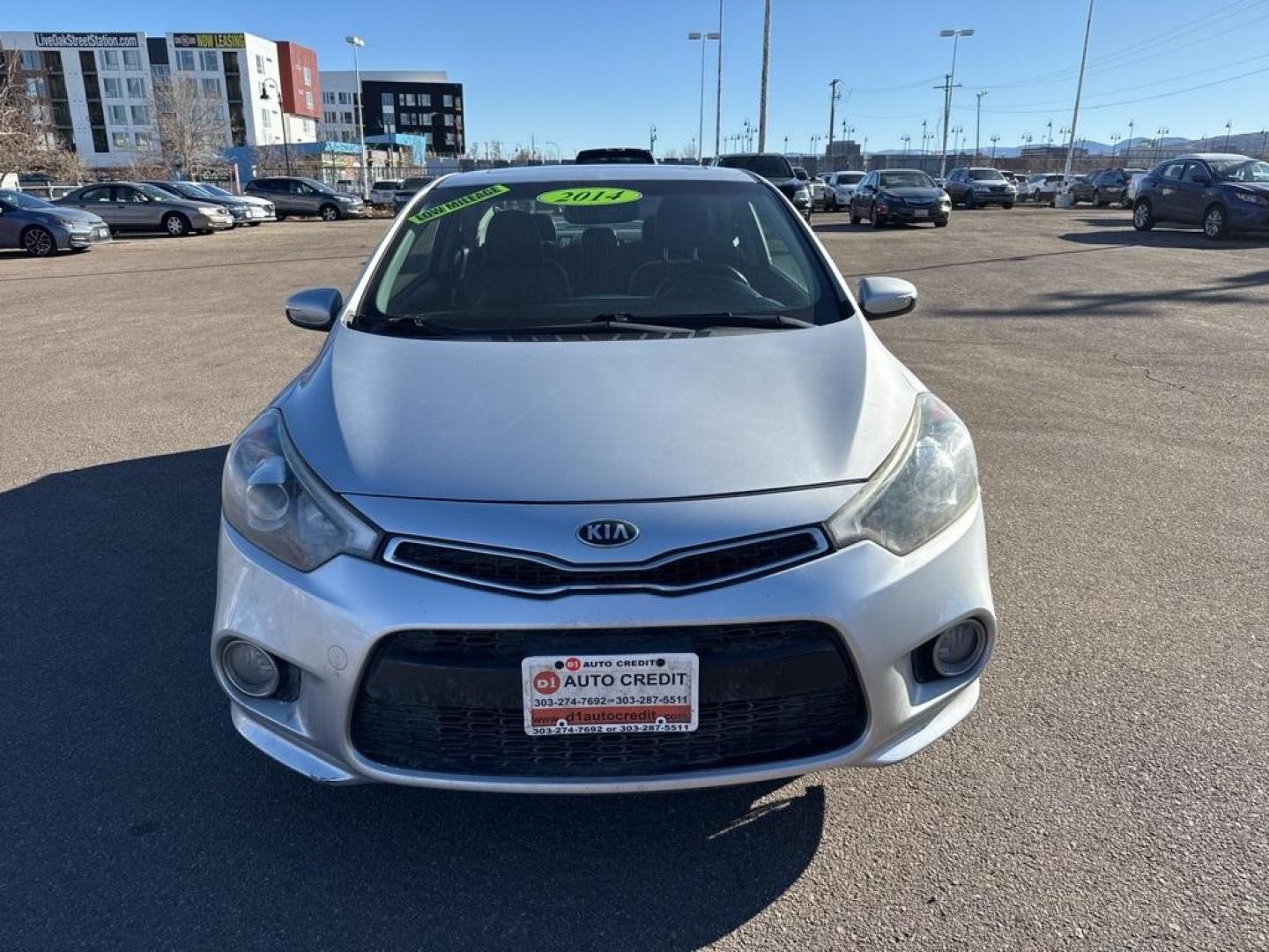 2014 Bright Silver /Black Kia Forte Koup EX (KNAFX6A8XE5) with an 2.0L I4 DOHC CVVT engine, Automatic transmission, located at 10890 W. Colfax Ave., Lakewood, CO, 80215, (303) 274-7692, 39.739914, -105.120132 - 2014 Kia Forte Koup FWD<br><br>D1 Auto NEVER charges dealer fees! All cars have clean titles and have been inspected for mechanical issues. We have financing for everyone. Good credit, bad credit, first time buyers.<br><br>Please call Lakewood Location 303-274-7692 or Thornton 303-287-5511 to schedu - Photo#1
