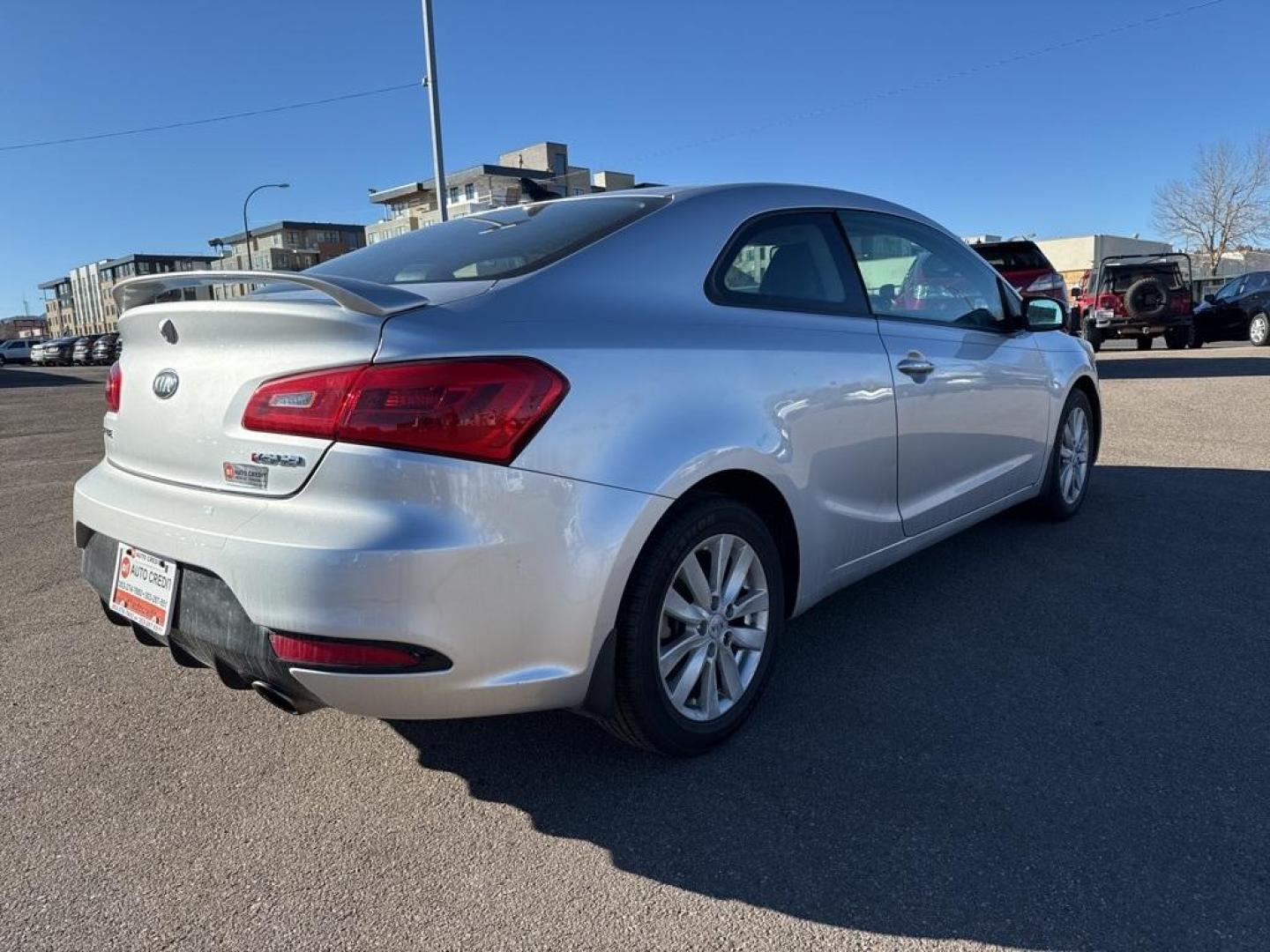 2014 Bright Silver /Black Kia Forte Koup EX (KNAFX6A8XE5) with an 2.0L I4 DOHC CVVT engine, Automatic transmission, located at 10890 W. Colfax Ave., Lakewood, CO, 80215, (303) 274-7692, 39.739914, -105.120132 - 2014 Kia Forte Koup FWD<br><br>D1 Auto NEVER charges dealer fees! All cars have clean titles and have been inspected for mechanical issues. We have financing for everyone. Good credit, bad credit, first time buyers.<br><br>Please call Lakewood Location 303-274-7692 or Thornton 303-287-5511 to schedu - Photo#4