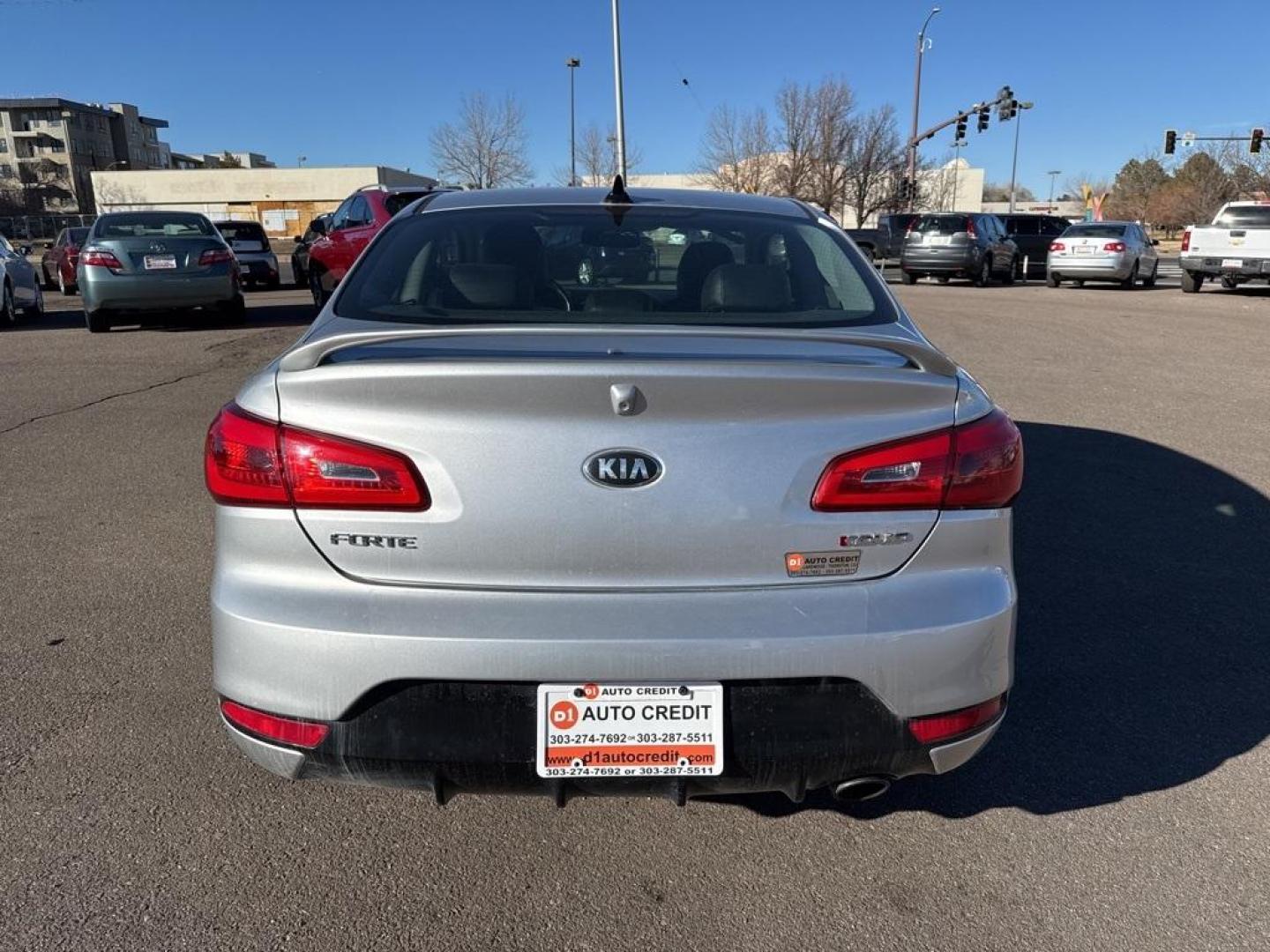 2014 Bright Silver /Black Kia Forte Koup EX (KNAFX6A8XE5) with an 2.0L I4 DOHC CVVT engine, Automatic transmission, located at 10890 W. Colfax Ave., Lakewood, CO, 80215, (303) 274-7692, 39.739914, -105.120132 - 2014 Kia Forte Koup FWD<br><br>D1 Auto NEVER charges dealer fees! All cars have clean titles and have been inspected for mechanical issues. We have financing for everyone. Good credit, bad credit, first time buyers.<br><br>Please call Lakewood Location 303-274-7692 or Thornton 303-287-5511 to schedu - Photo#5