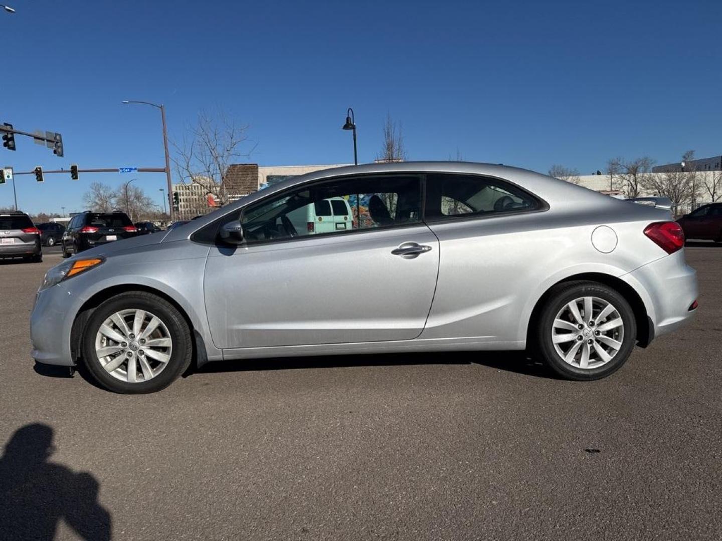 2014 Bright Silver /Black Kia Forte Koup EX (KNAFX6A8XE5) with an 2.0L I4 DOHC CVVT engine, Automatic transmission, located at 10890 W. Colfax Ave., Lakewood, CO, 80215, (303) 274-7692, 39.739914, -105.120132 - 2014 Kia Forte Koup FWD<br><br>D1 Auto NEVER charges dealer fees! All cars have clean titles and have been inspected for mechanical issues. We have financing for everyone. Good credit, bad credit, first time buyers.<br><br>Please call Lakewood Location 303-274-7692 or Thornton 303-287-5511 to schedu - Photo#7
