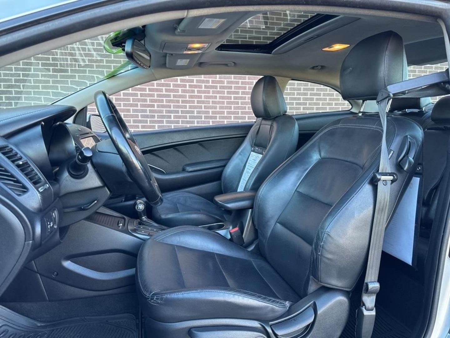 2014 Bright Silver /Black Kia Forte Koup EX (KNAFX6A8XE5) with an 2.0L I4 DOHC CVVT engine, Automatic transmission, located at 10890 W. Colfax Ave., Lakewood, CO, 80215, (303) 274-7692, 39.739914, -105.120132 - 2014 Kia Forte Koup FWD<br><br>D1 Auto NEVER charges dealer fees! All cars have clean titles and have been inspected for mechanical issues. We have financing for everyone. Good credit, bad credit, first time buyers.<br><br>Please call Lakewood Location 303-274-7692 or Thornton 303-287-5511 to schedu - Photo#14