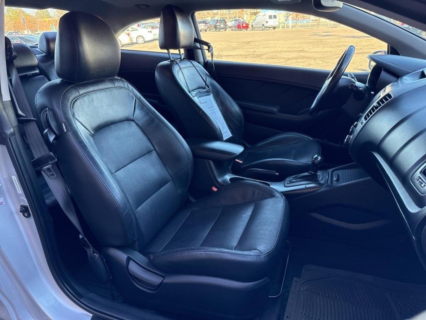 2014 Bright Silver /Black Kia Forte Koup EX (KNAFX6A8XE5) with an 2.0L I4 DOHC CVVT engine, Automatic transmission, located at 10890 W. Colfax Ave., Lakewood, CO, 80215, (303) 274-7692, 39.739914, -105.120132 - 2014 Kia Forte Koup FWD<br><br>D1 Auto NEVER charges dealer fees! All cars have clean titles and have been inspected for mechanical issues. We have financing for everyone. Good credit, bad credit, first time buyers.<br><br>Please call Lakewood Location 303-274-7692 or Thornton 303-287-5511 to schedu - Photo#15