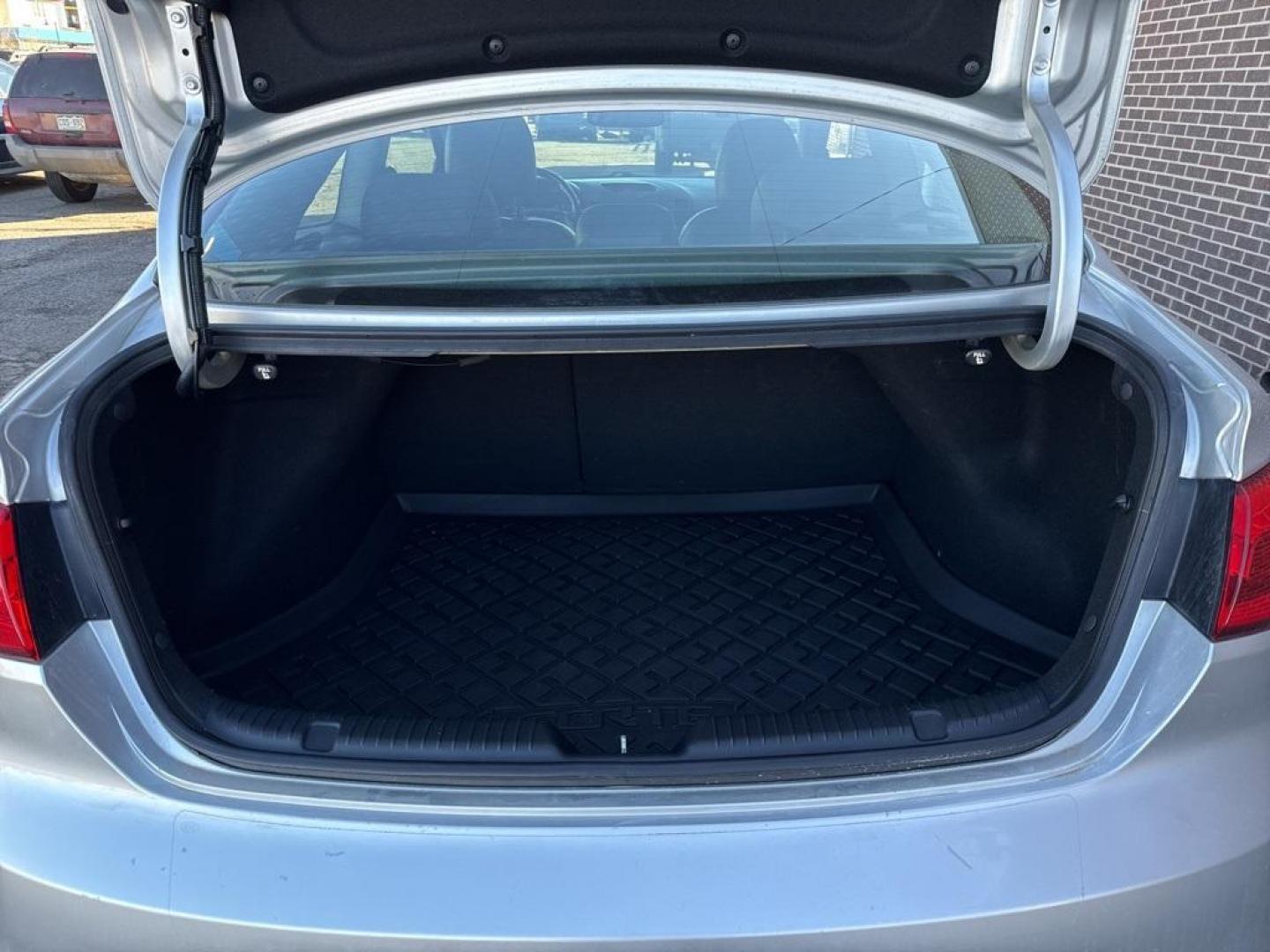 2014 Bright Silver /Black Kia Forte Koup EX (KNAFX6A8XE5) with an 2.0L I4 DOHC CVVT engine, Automatic transmission, located at 10890 W. Colfax Ave., Lakewood, CO, 80215, (303) 274-7692, 39.739914, -105.120132 - 2014 Kia Forte Koup FWD<br><br>D1 Auto NEVER charges dealer fees! All cars have clean titles and have been inspected for mechanical issues. We have financing for everyone. Good credit, bad credit, first time buyers.<br><br>Please call Lakewood Location 303-274-7692 or Thornton 303-287-5511 to schedu - Photo#17