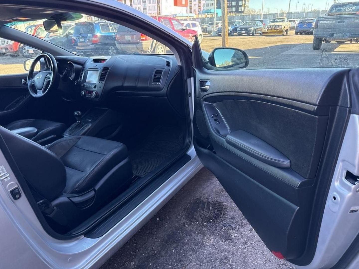 2014 Bright Silver /Black Kia Forte Koup EX (KNAFX6A8XE5) with an 2.0L I4 DOHC CVVT engine, Automatic transmission, located at 10890 W. Colfax Ave., Lakewood, CO, 80215, (303) 274-7692, 39.739914, -105.120132 - 2014 Kia Forte Koup FWD<br><br>D1 Auto NEVER charges dealer fees! All cars have clean titles and have been inspected for mechanical issues. We have financing for everyone. Good credit, bad credit, first time buyers.<br><br>Please call Lakewood Location 303-274-7692 or Thornton 303-287-5511 to schedu - Photo#18