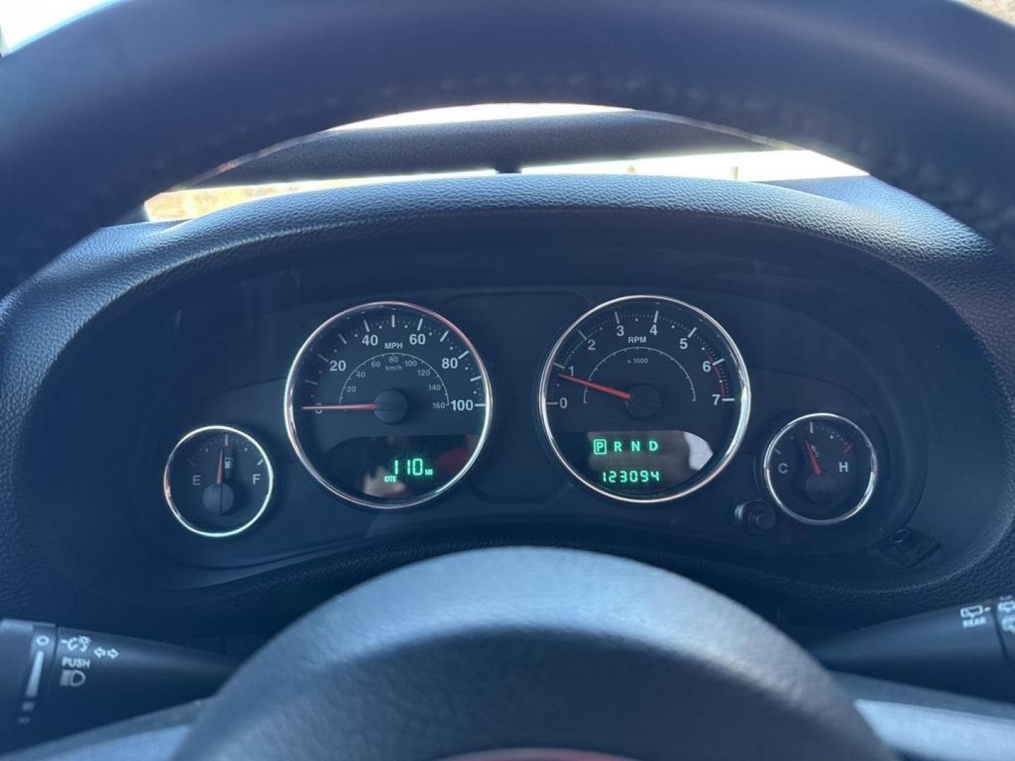 2011 RED /BLACK Jeep Wrangler Rubicon (1J4BA6D11BL) with an V6, 3.8L engine, Automatic transmission, located at 10890 W. Colfax Ave., Lakewood, CO, 80215, (303) 274-7692, 39.739914, -105.120132 - Get ready for adventure with this 2011 Jeep Wrangler Rubicon, a true icon of off-road prowess and rugged style. This trail-ready beast is equipped with a robust 4WD system and a powerful V6, 3.8L engine that promises an exhilarating drive, whether you're navigating city streets or tackling rugged tr - Photo#41