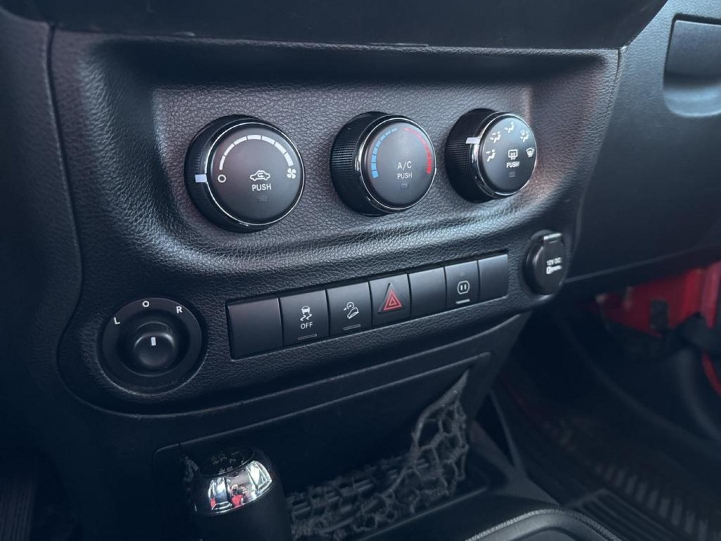 2011 RED /BLACK Jeep Wrangler Rubicon (1J4BA6D11BL) with an V6, 3.8L engine, Automatic transmission, located at 10890 W. Colfax Ave., Lakewood, CO, 80215, (303) 274-7692, 39.739914, -105.120132 - Get ready for adventure with this 2011 Jeep Wrangler Rubicon, a true icon of off-road prowess and rugged style. This trail-ready beast is equipped with a robust 4WD system and a powerful V6, 3.8L engine that promises an exhilarating drive, whether you're navigating city streets or tackling rugged tr - Photo#43