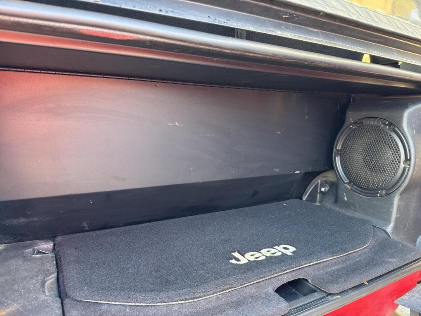 2011 RED /BLACK Jeep Wrangler Rubicon (1J4BA6D11BL) with an V6, 3.8L engine, Automatic transmission, located at 10890 W. Colfax Ave., Lakewood, CO, 80215, (303) 274-7692, 39.739914, -105.120132 - Get ready for adventure with this 2011 Jeep Wrangler Rubicon, a true icon of off-road prowess and rugged style. This trail-ready beast is equipped with a robust 4WD system and a powerful V6, 3.8L engine that promises an exhilarating drive, whether you're navigating city streets or tackling rugged tr - Photo#49