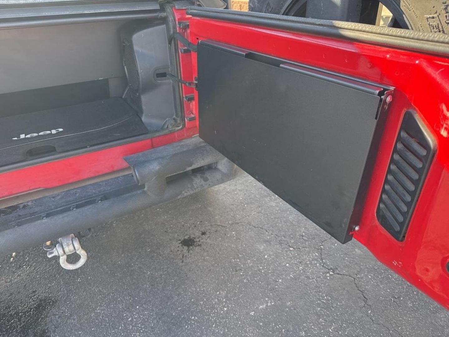 2011 RED /BLACK Jeep Wrangler Rubicon (1J4BA6D11BL) with an V6, 3.8L engine, Automatic transmission, located at 10890 W. Colfax Ave., Lakewood, CO, 80215, (303) 274-7692, 39.739914, -105.120132 - Get ready for adventure with this 2011 Jeep Wrangler Rubicon, a true icon of off-road prowess and rugged style. This trail-ready beast is equipped with a robust 4WD system and a powerful V6, 3.8L engine that promises an exhilarating drive, whether you're navigating city streets or tackling rugged tr - Photo#51