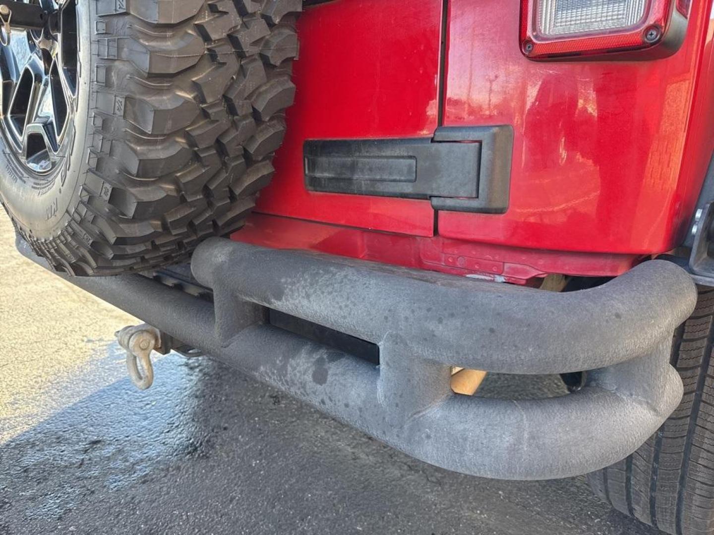 2011 RED /BLACK Jeep Wrangler Rubicon (1J4BA6D11BL) with an V6, 3.8L engine, Automatic transmission, located at 10890 W. Colfax Ave., Lakewood, CO, 80215, (303) 274-7692, 39.739914, -105.120132 - Get ready for adventure with this 2011 Jeep Wrangler Rubicon, a true icon of off-road prowess and rugged style. This trail-ready beast is equipped with a robust 4WD system and a powerful V6, 3.8L engine that promises an exhilarating drive, whether you're navigating city streets or tackling rugged tr - Photo#52
