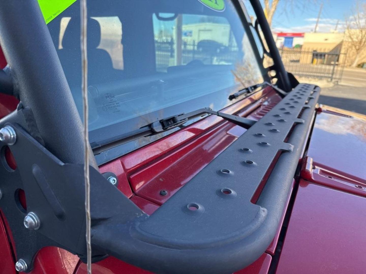 2011 RED /BLACK Jeep Wrangler Rubicon (1J4BA6D11BL) with an V6, 3.8L engine, Automatic transmission, located at 10890 W. Colfax Ave., Lakewood, CO, 80215, (303) 274-7692, 39.739914, -105.120132 - Get ready for adventure with this 2011 Jeep Wrangler Rubicon, a true icon of off-road prowess and rugged style. This trail-ready beast is equipped with a robust 4WD system and a powerful V6, 3.8L engine that promises an exhilarating drive, whether you're navigating city streets or tackling rugged tr - Photo#62