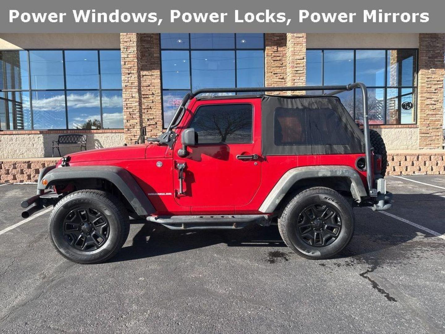2011 RED /BLACK Jeep Wrangler Rubicon (1J4BA6D11BL) with an V6, 3.8L engine, Automatic transmission, located at 10890 W. Colfax Ave., Lakewood, CO, 80215, (303) 274-7692, 39.739914, -105.120132 - Get ready for adventure with this 2011 Jeep Wrangler Rubicon, a true icon of off-road prowess and rugged style. This trail-ready beast is equipped with a robust 4WD system and a powerful V6, 3.8L engine that promises an exhilarating drive, whether you're navigating city streets or tackling rugged tr - Photo#4