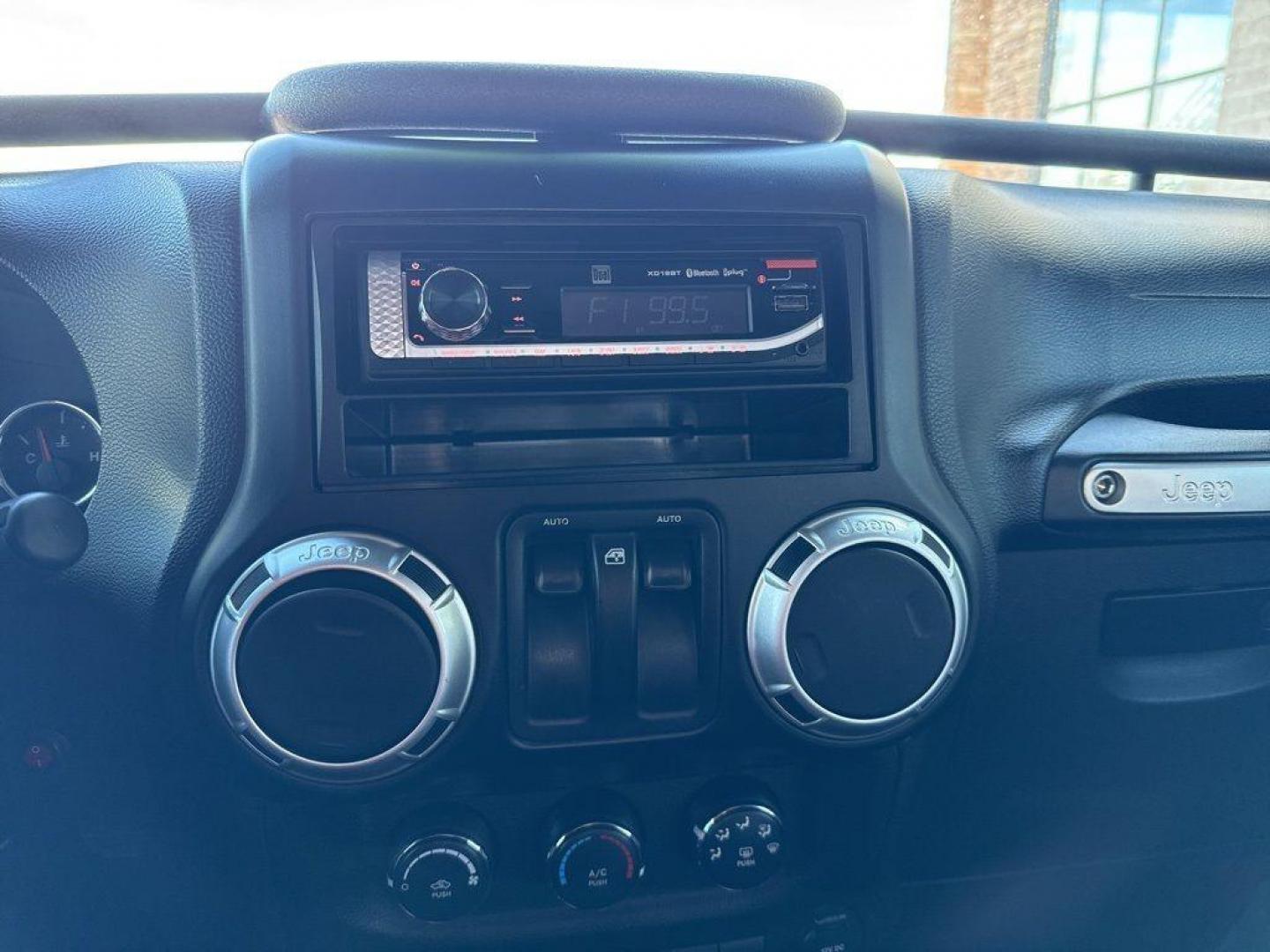 2011 RED /BLACK Jeep Wrangler Rubicon (1J4BA6D11BL) with an V6, 3.8L engine, Automatic transmission, located at 10890 W. Colfax Ave., Lakewood, CO, 80215, (303) 274-7692, 39.739914, -105.120132 - Get ready for adventure with this 2011 Jeep Wrangler Rubicon, a true icon of off-road prowess and rugged style. This trail-ready beast is equipped with a robust 4WD system and a powerful V6, 3.8L engine that promises an exhilarating drive, whether you're navigating city streets or tackling rugged tr - Photo#9