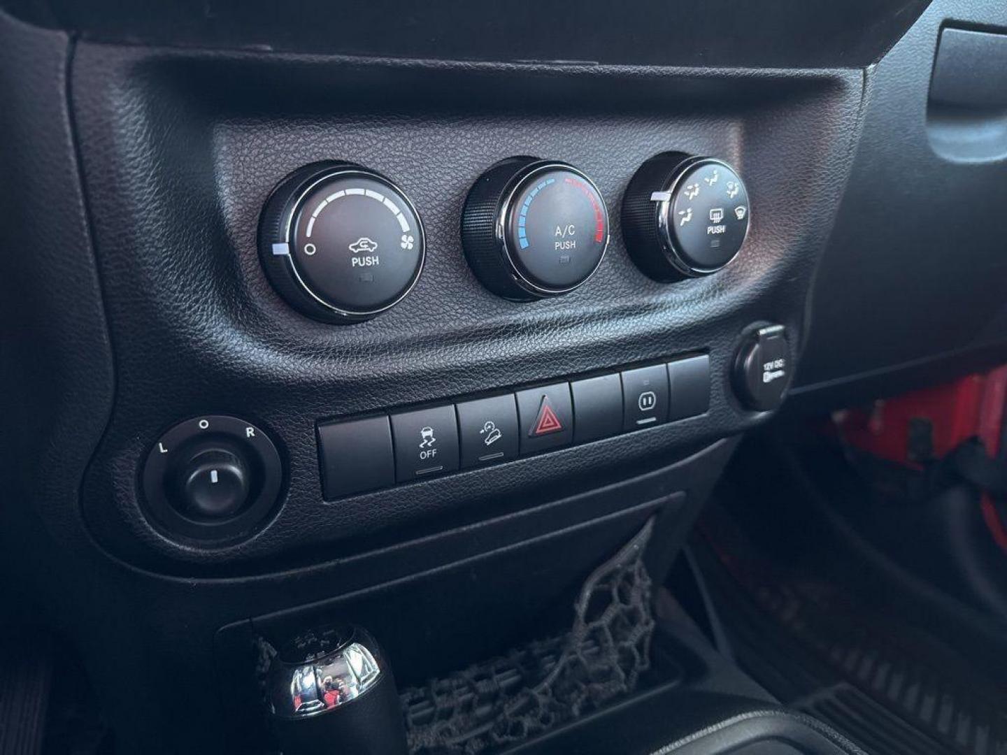 2011 RED /BLACK Jeep Wrangler Rubicon (1J4BA6D11BL) with an V6, 3.8L engine, Automatic transmission, located at 10890 W. Colfax Ave., Lakewood, CO, 80215, (303) 274-7692, 39.739914, -105.120132 - Get ready for adventure with this 2011 Jeep Wrangler Rubicon, a true icon of off-road prowess and rugged style. This trail-ready beast is equipped with a robust 4WD system and a powerful V6, 3.8L engine that promises an exhilarating drive, whether you're navigating city streets or tackling rugged tr - Photo#10