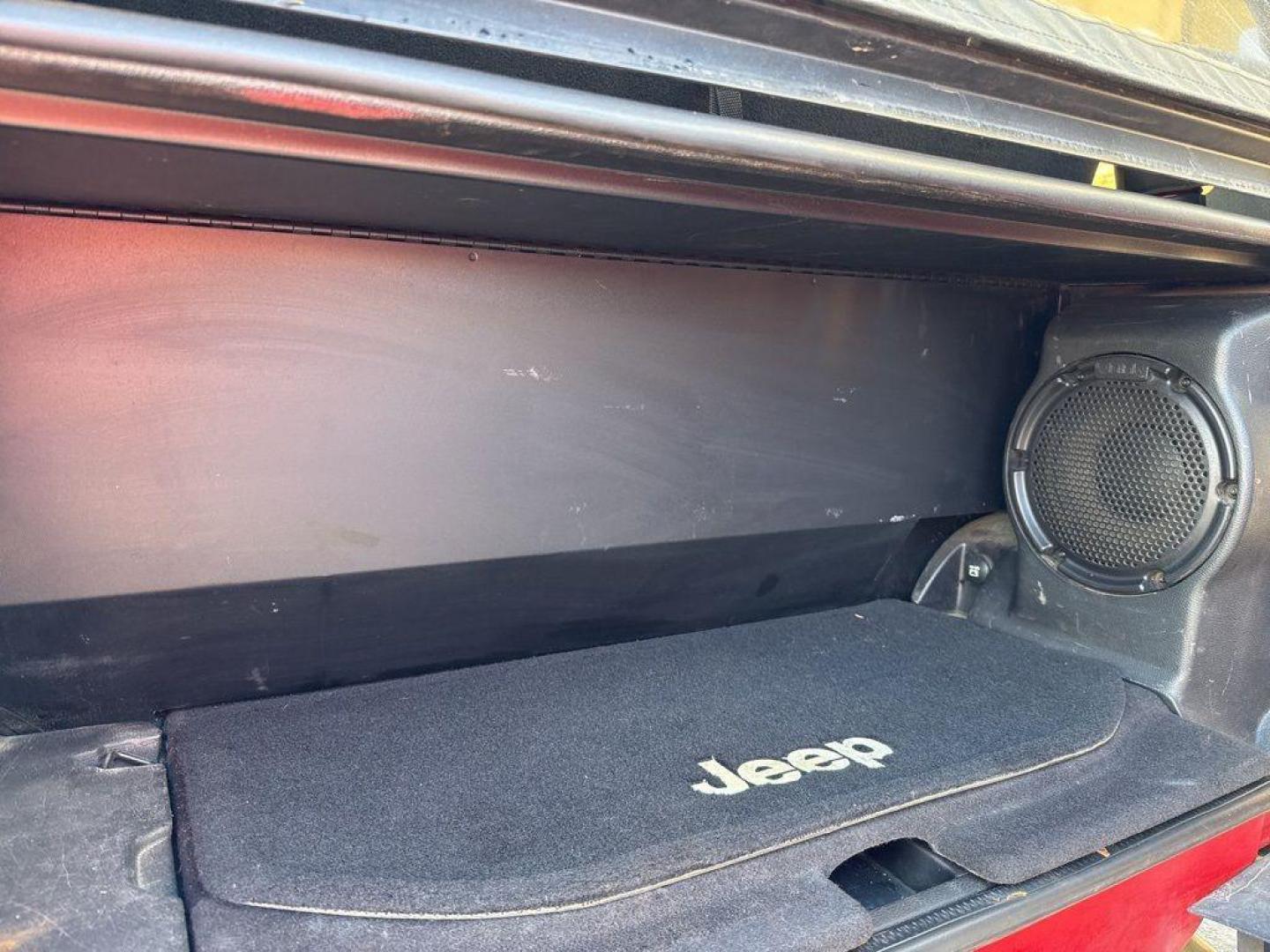 2011 RED /BLACK Jeep Wrangler Rubicon (1J4BA6D11BL) with an V6, 3.8L engine, Automatic transmission, located at 10890 W. Colfax Ave., Lakewood, CO, 80215, (303) 274-7692, 39.739914, -105.120132 - Get ready for adventure with this 2011 Jeep Wrangler Rubicon, a true icon of off-road prowess and rugged style. This trail-ready beast is equipped with a robust 4WD system and a powerful V6, 3.8L engine that promises an exhilarating drive, whether you're navigating city streets or tackling rugged tr - Photo#16