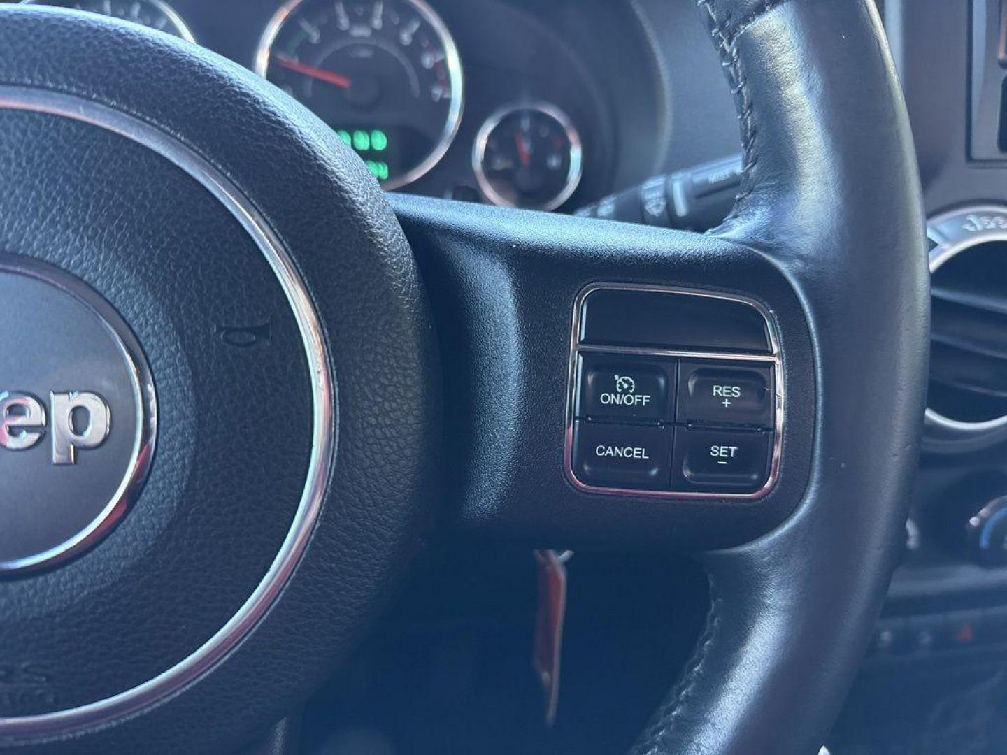 2011 RED /BLACK Jeep Wrangler Rubicon (1J4BA6D11BL) with an V6, 3.8L engine, Automatic transmission, located at 10890 W. Colfax Ave., Lakewood, CO, 80215, (303) 274-7692, 39.739914, -105.120132 - Get ready for adventure with this 2011 Jeep Wrangler Rubicon, a true icon of off-road prowess and rugged style. This trail-ready beast is equipped with a robust 4WD system and a powerful V6, 3.8L engine that promises an exhilarating drive, whether you're navigating city streets or tackling rugged tr - Photo#27
