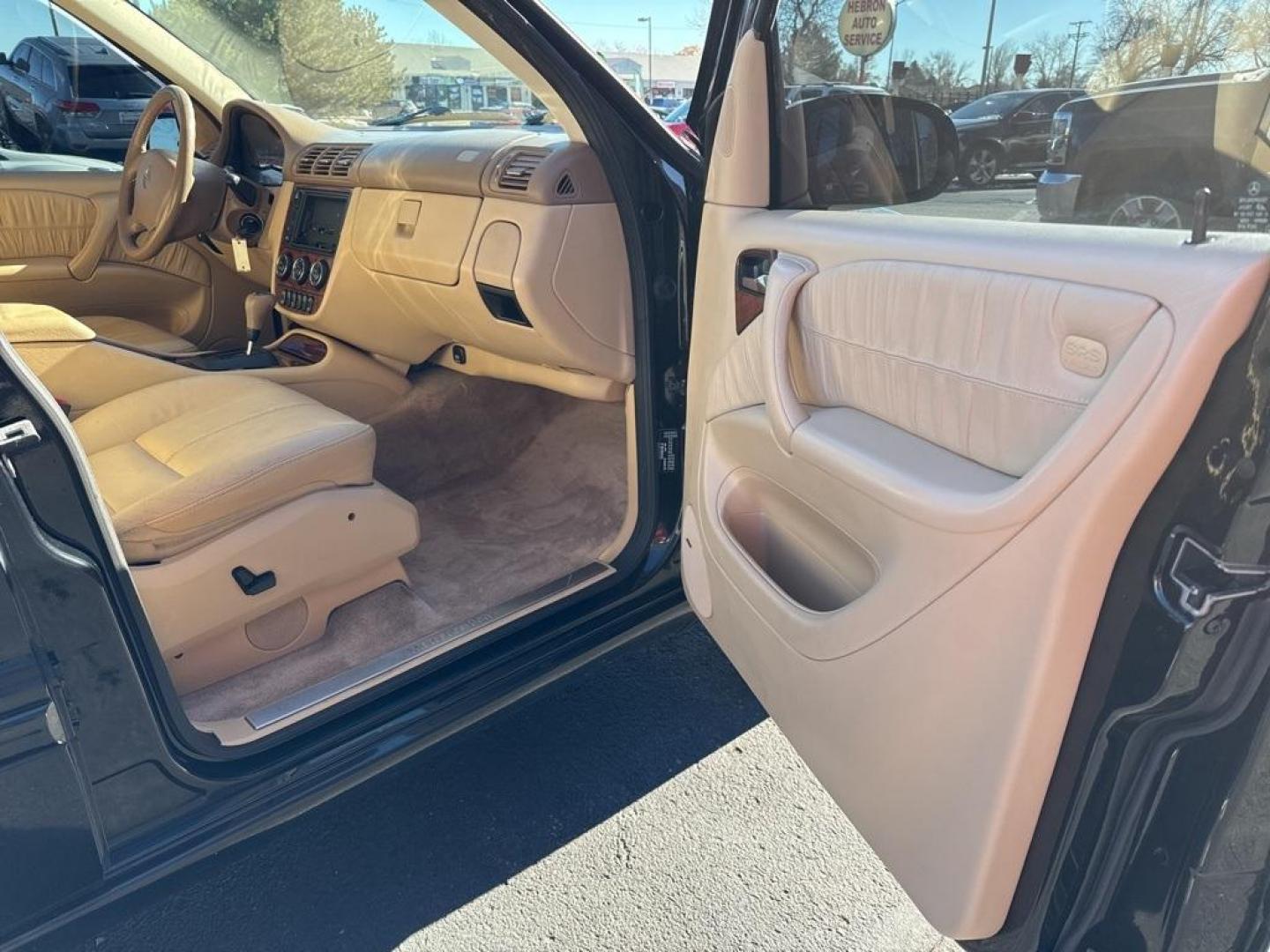 2003 Black /Java Mercedes-Benz M-Class ML 350 (4JGAB57E93A) with an 3.7L V6 SMPI SOHC engine, Automatic transmission, located at 10890 W. Colfax Ave., Lakewood, CO, 80215, (303) 274-7692, 39.739914, -105.120132 - 2003 Mercedes-Benz M-Class 4MATIC runs like a top. No oil leaks, recently serviced and ready for Colorado. Does need a radio and window regulator. This thing is a tank and runs amazing. <br><br>D1 Auto NEVER charges dealer fees! All cars have clean titles and have been inspected for mechanical issue - Photo#17