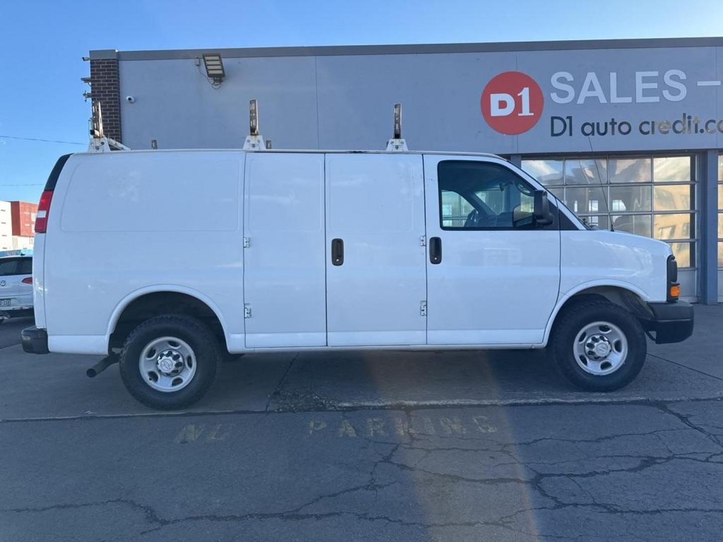 2015 Summit White /Medium Pewter Chevrolet Express 2500 Work Van (1GCWGFCFXF1) with an Vortec 4.8L V8 SFI engine, Automatic transmission, located at 10890 W. Colfax Ave., Lakewood, CO, 80215, (303) 274-7692, 39.739914, -105.120132 - 2015 Chevrolet Express 2500 CARFAX One-Owner. RWD Cargo<br><br>D1 Auto NEVER charges dealer fees! All cars have clean titles and have been inspected for mechanical issues. We have financing for everyone. Good credit, bad credit, first time buyers.<br>Clean CARFAX.<br>Please call Lakewood Location 30 - Photo#3