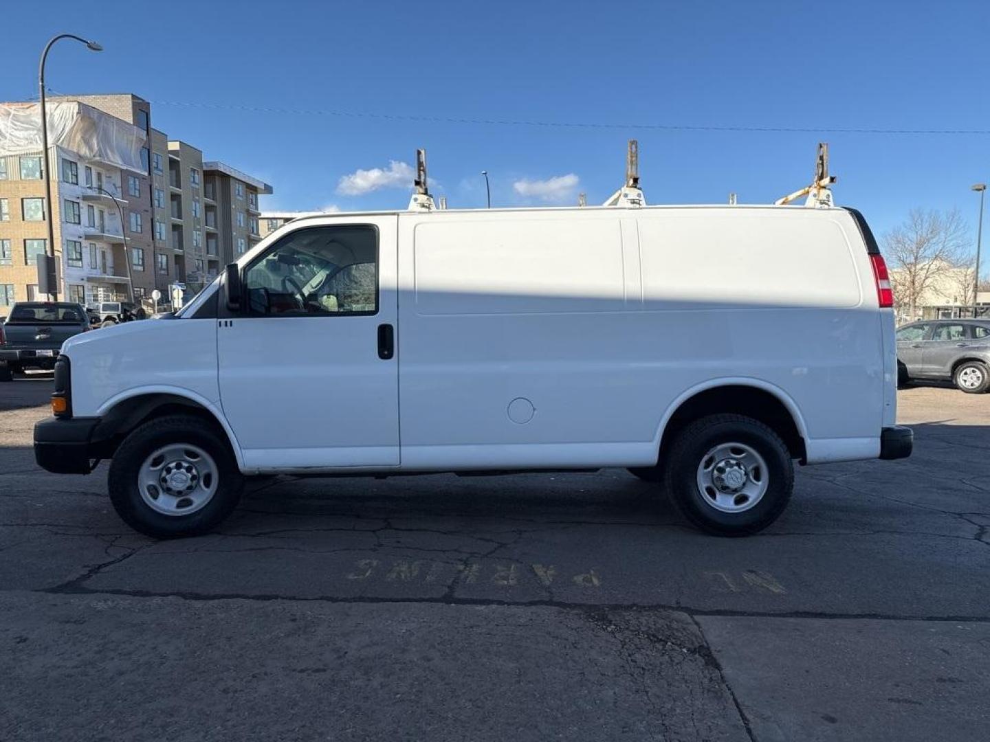 2015 Summit White /Medium Pewter Chevrolet Express 2500 Work Van (1GCWGFCFXF1) with an Vortec 4.8L V8 SFI engine, Automatic transmission, located at 10890 W. Colfax Ave., Lakewood, CO, 80215, (303) 274-7692, 39.739914, -105.120132 - 2015 Chevrolet Express 2500 CARFAX One-Owner. RWD Cargo<br><br>D1 Auto NEVER charges dealer fees! All cars have clean titles and have been inspected for mechanical issues. We have financing for everyone. Good credit, bad credit, first time buyers.<br>Clean CARFAX.<br>Please call Lakewood Location 30 - Photo#7