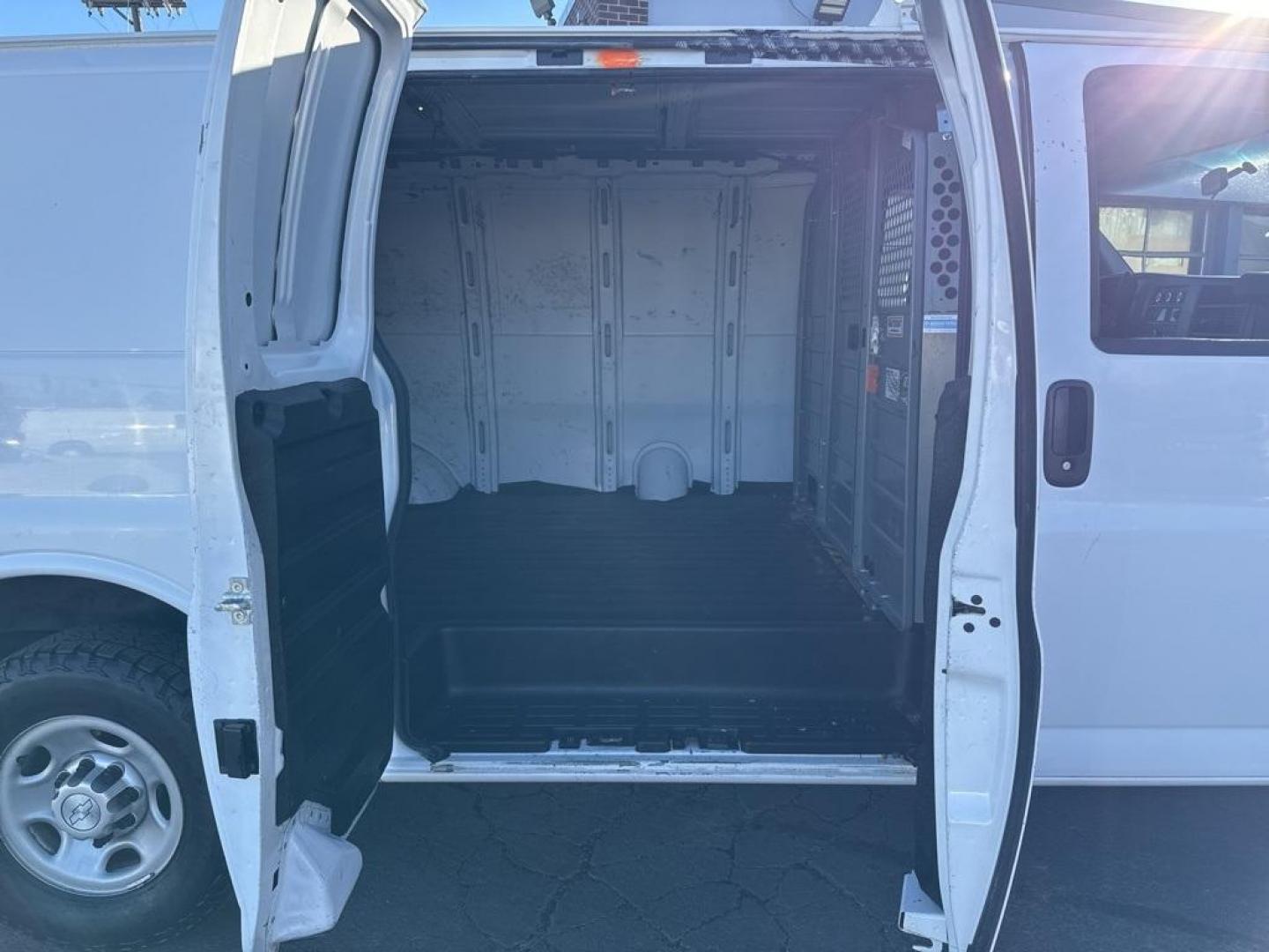 2015 Summit White /Medium Pewter Chevrolet Express 2500 Work Van (1GCWGFCFXF1) with an Vortec 4.8L V8 SFI engine, Automatic transmission, located at 10890 W. Colfax Ave., Lakewood, CO, 80215, (303) 274-7692, 39.739914, -105.120132 - 2015 Chevrolet Express 2500 CARFAX One-Owner. RWD Cargo<br><br>D1 Auto NEVER charges dealer fees! All cars have clean titles and have been inspected for mechanical issues. We have financing for everyone. Good credit, bad credit, first time buyers.<br>Clean CARFAX.<br>Please call Lakewood Location 30 - Photo#9