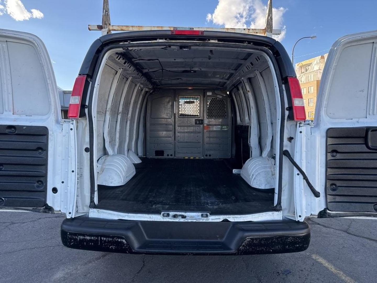 2015 Summit White /Medium Pewter Chevrolet Express 2500 Work Van (1GCWGFCFXF1) with an Vortec 4.8L V8 SFI engine, Automatic transmission, located at 10890 W. Colfax Ave., Lakewood, CO, 80215, (303) 274-7692, 39.739914, -105.120132 - 2015 Chevrolet Express 2500 CARFAX One-Owner. RWD Cargo<br><br>D1 Auto NEVER charges dealer fees! All cars have clean titles and have been inspected for mechanical issues. We have financing for everyone. Good credit, bad credit, first time buyers.<br>Clean CARFAX.<br>Please call Lakewood Location 30 - Photo#12
