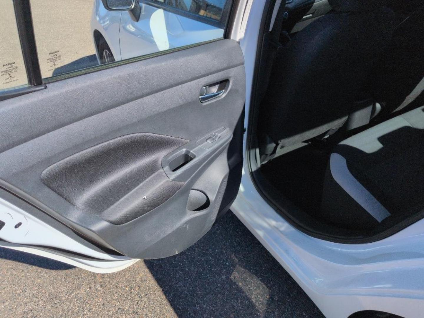 2022 WHITE /ACTUAL Nissan Versa SV (3N1CN8EV9NL) with an 4 Cyl, 1.6L engine, Automatic transmission, located at 10890 W. Colfax Ave., Lakewood, CO, 80215, (303) 274-7692, 39.739914, -105.120132 - Discover the perfect blend of style, efficiency, and reliability with this 2022 Nissan Versa SV. This compact sedan is ideal for those seeking an economical yet comfortable driving experience. Equipped with a 4-cylinder, 1.6L engine and front-wheel drive, this vehicle ensures a smooth, responsive ri - Photo#14