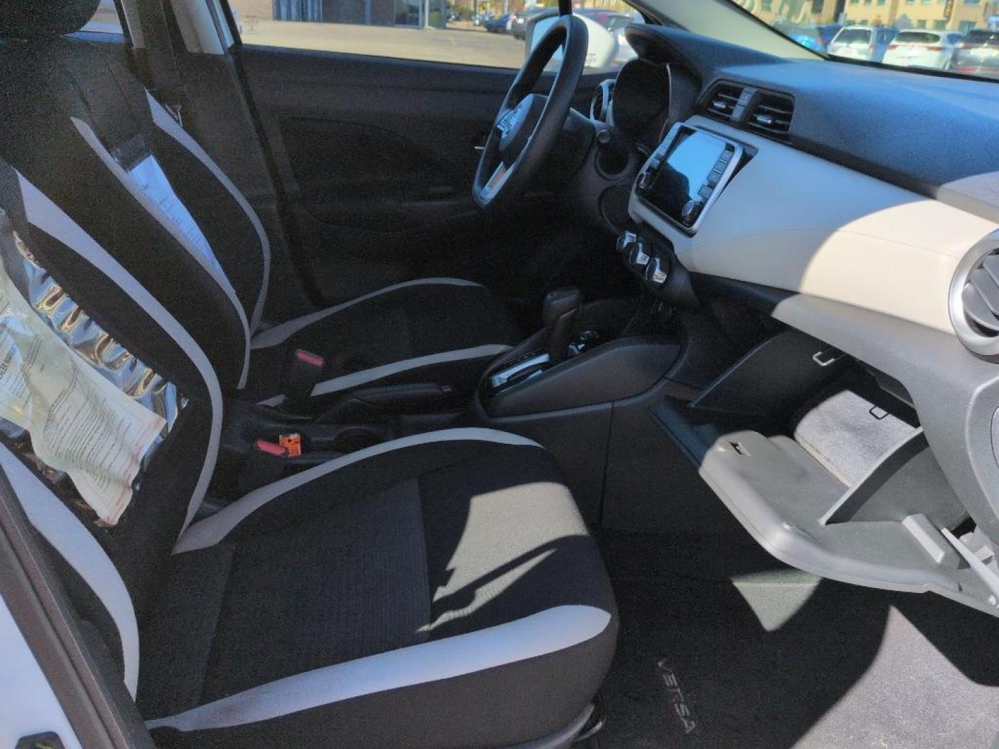 2022 WHITE /ACTUAL Nissan Versa SV (3N1CN8EV9NL) with an 4 Cyl, 1.6L engine, Automatic transmission, located at 10890 W. Colfax Ave., Lakewood, CO, 80215, (303) 274-7692, 39.739914, -105.120132 - Discover the perfect blend of style, efficiency, and reliability with this 2022 Nissan Versa SV. This compact sedan is ideal for those seeking an economical yet comfortable driving experience. Equipped with a 4-cylinder, 1.6L engine and front-wheel drive, this vehicle ensures a smooth, responsive ri - Photo#17