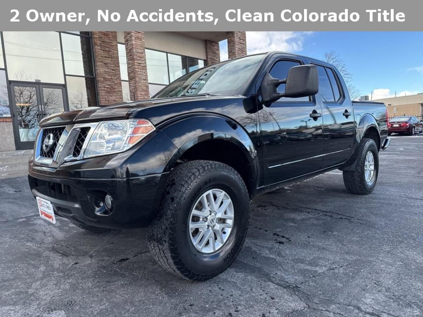 2015 Black /Graphite Nissan Frontier SV (1N6AD0EV5FN) with an 4.0L V6 DOHC engine, Automatic transmission, located at 10890 W. Colfax Ave., Lakewood, CO, 80215, (303) 274-7692, 39.739914, -105.120132 - 2015 Nissan Frontier SV 4WD with clean Carfax, no accidents and fully serviced. This truck is a non smoker, non pet car and has a 2 inch leveling kit and soft tanneau cover. You can tell the previous owner took good care if this one. <br><br>All Cars Have Clean Titles And Are Serviced Before Sale., - Photo#0