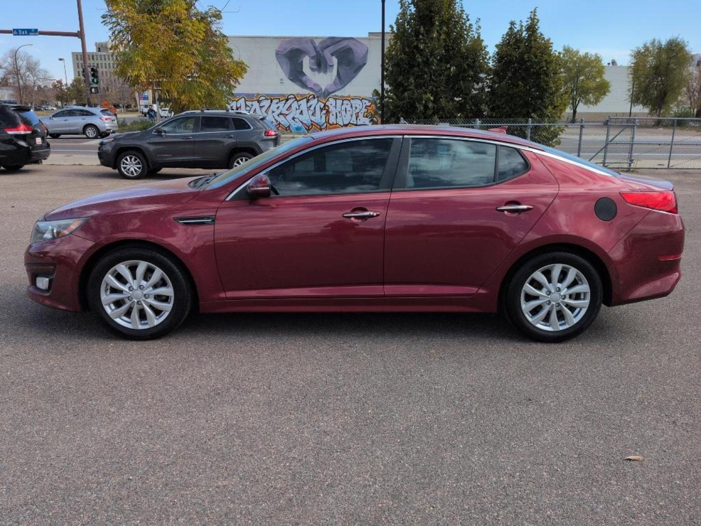 2015 RED Kia Optima EX (5XXGN4A71FG) with an 4 Cyl, 2.4L engine, Automatic transmission, located at 10890 W. Colfax Ave., Lakewood, CO, 80215, (303) 274-7692, 39.739914, -105.120132 - Photo#7