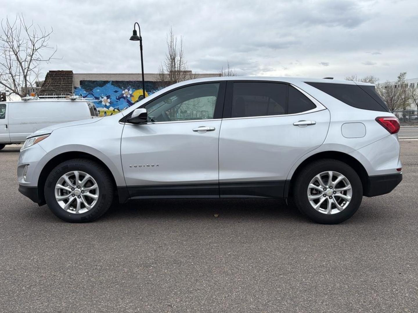 2020 SILVER Chevrolet Equinox LT (1LT) (2GNAXUEV4L6) with an 4 Cyl, 1.5L engine, Automatic transmission, located at 10890 W. Colfax Ave., Lakewood, CO, 80215, (303) 274-7692, 39.739914, -105.120132 - <b>Summary</b><br>Apple/ Android Carplay, Fully Serviced And Ready For Colorado! Non smoker,<br><br><b>Vehicle Details</b><br>Experience the perfect blend of style, efficiency, and versatility with this impressive 2020 Chevrolet Equinox LT (1LT)! This dynamic SUV is ready to elevate your driving exp - Photo#7