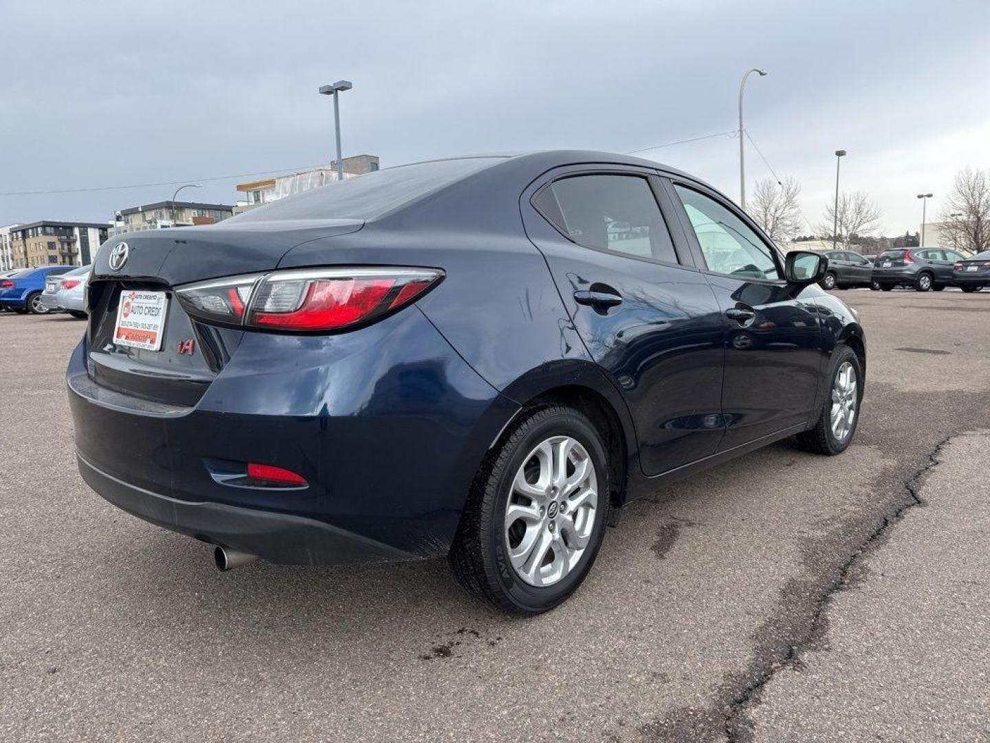 2017 BLUE Toyota Yaris iA Base (3MYDLBYV6HY) with an 4 Cyl, 1.5L engine, Automatic transmission, located at 10890 W. Colfax Ave., Lakewood, CO, 80215, (303) 274-7692, 39.739914, -105.120132 - Photo#4