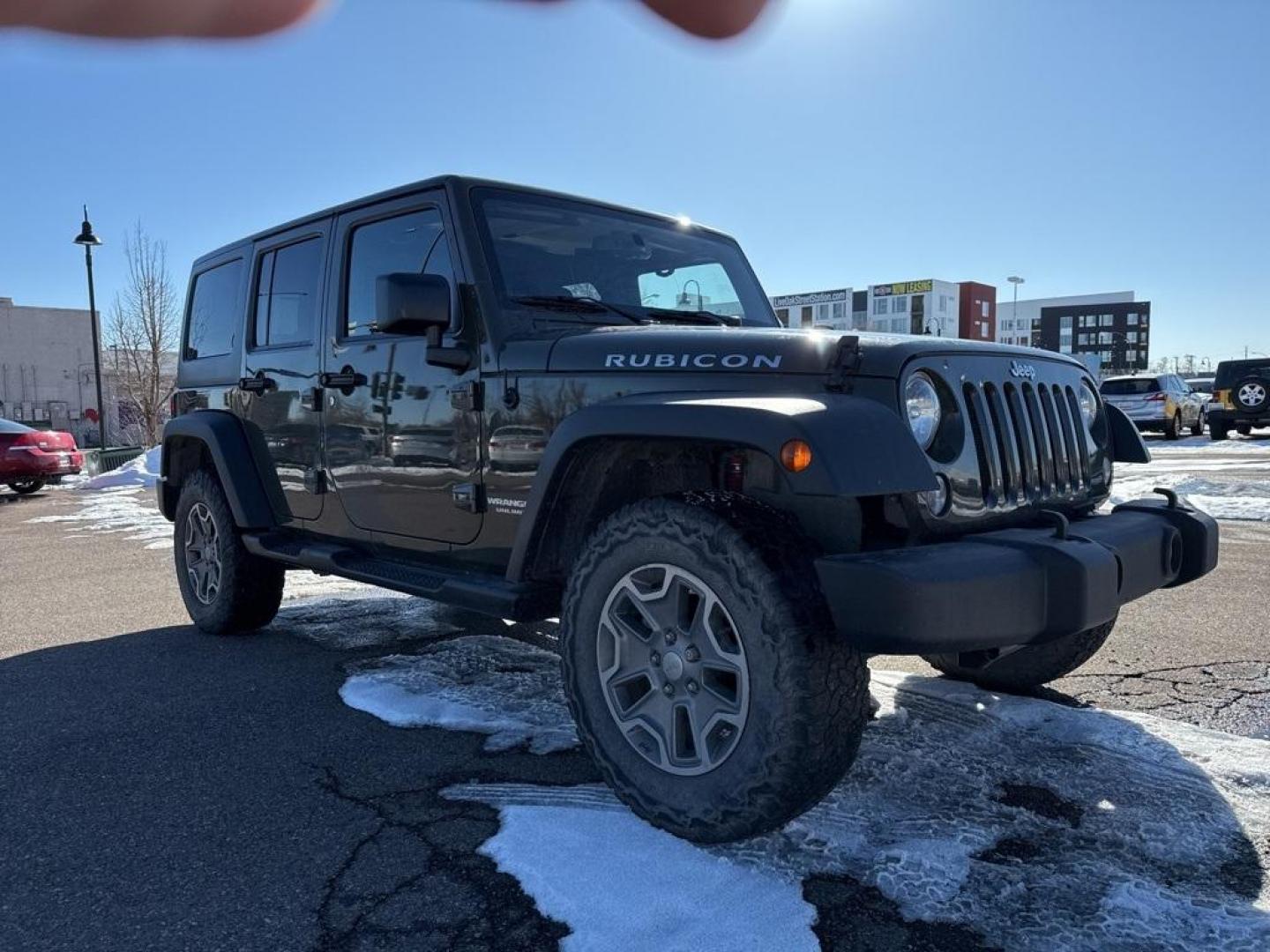 2015 Tank Clearcoat /Black Jeep Wrangler Unlimited Rubicon (1C4BJWFG7FL) with an 3.6L V6 24V VVT engine, Manual transmission, located at 10890 W. Colfax Ave., Lakewood, CO, 80215, (303) 274-7692, 39.739914, -105.120132 - 2015 Jeep Wrangler 4WD All Cars Have Clean Titles And Are Serviced Before Sale., Clean Carfax, No Accident, Non Smoker, 3.6L V6 24V VVT, 6-Speed Manual, 4WD, Body Color 3-Piece Hard Top.<br><br>D1 Auto NEVER charges dealer fees! All cars have clean titles and have been inspected for mechanical issue - Photo#2